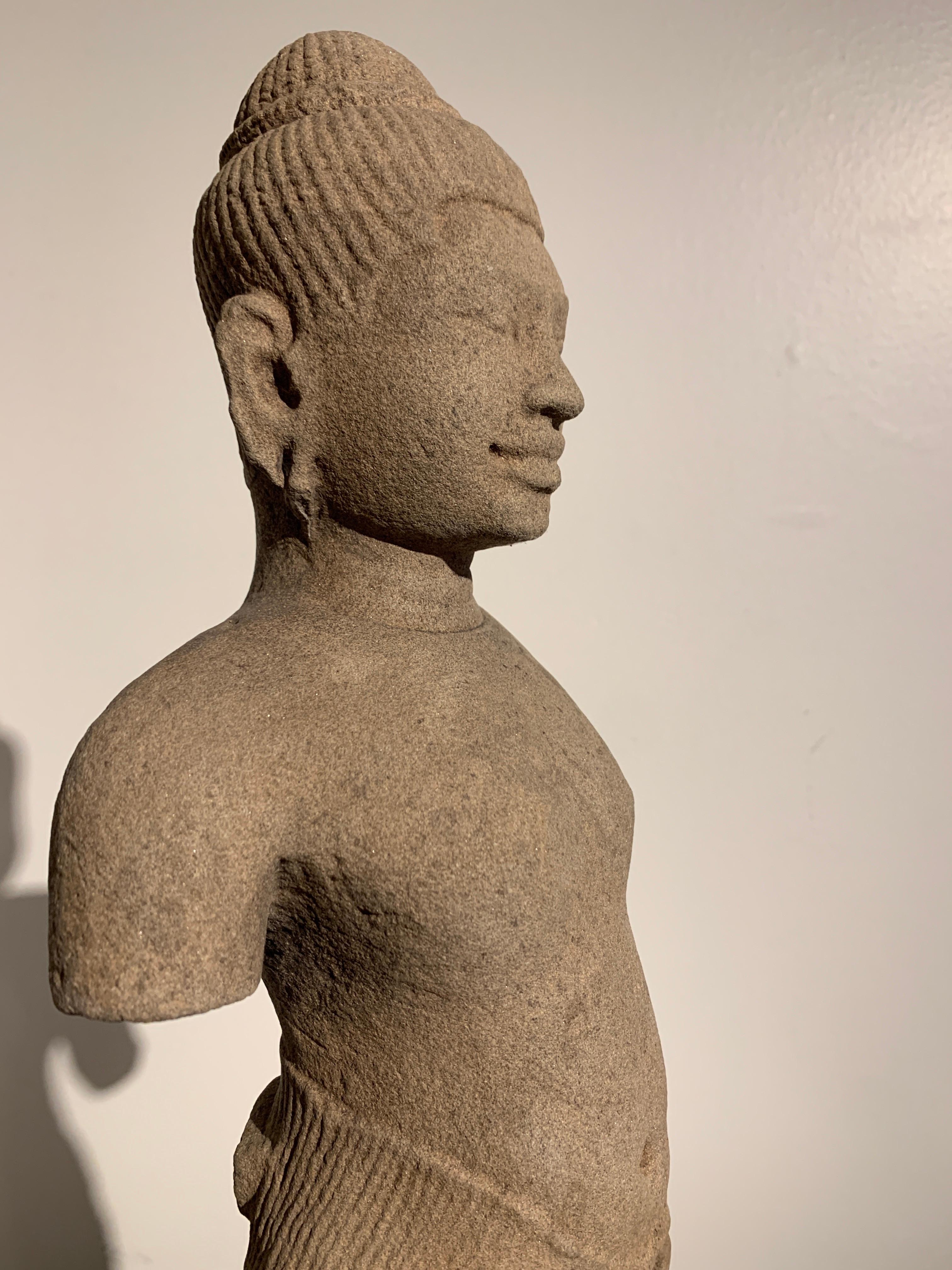 18th Century and Earlier Khmer Carved Sandstone Male Deity, Style of the Baphoun, 11th Century For Sale