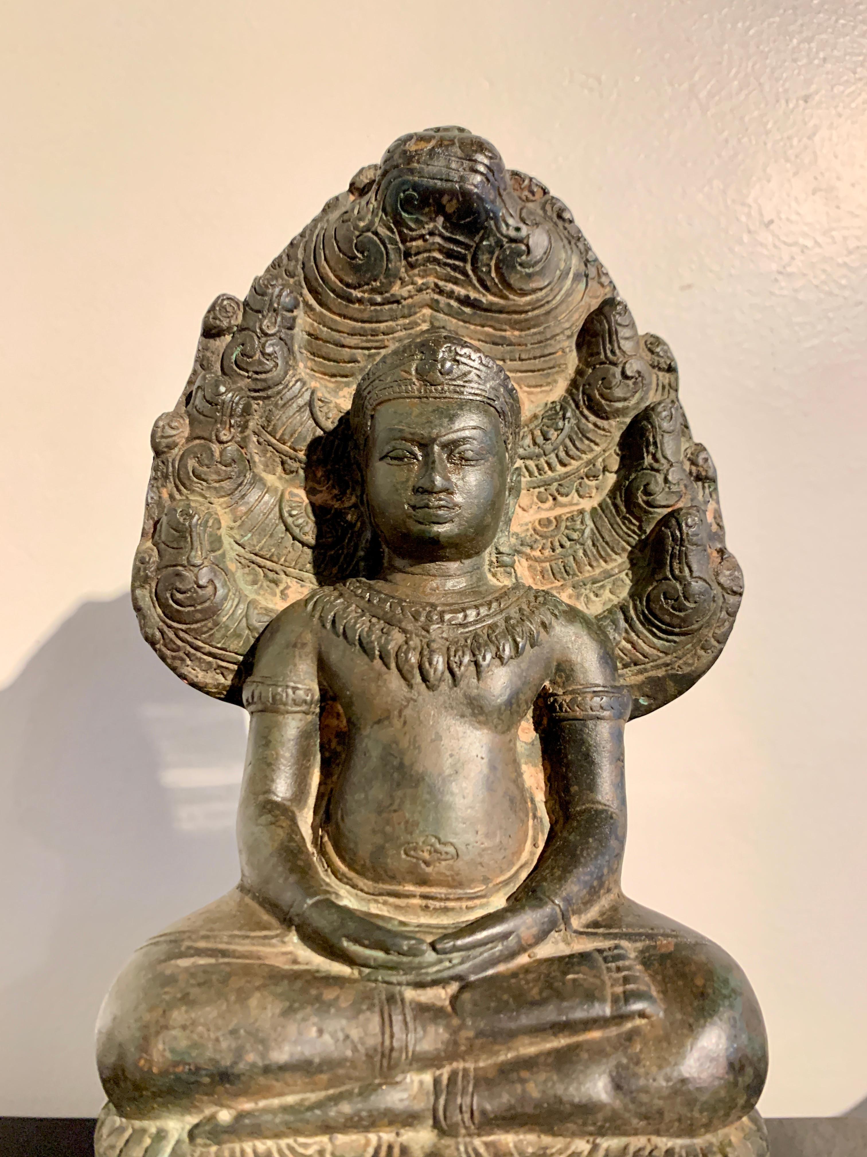 Khmer Cast Bronze Buddha Sheltered by Naga, 19th Century, Cambodia  For Sale 4