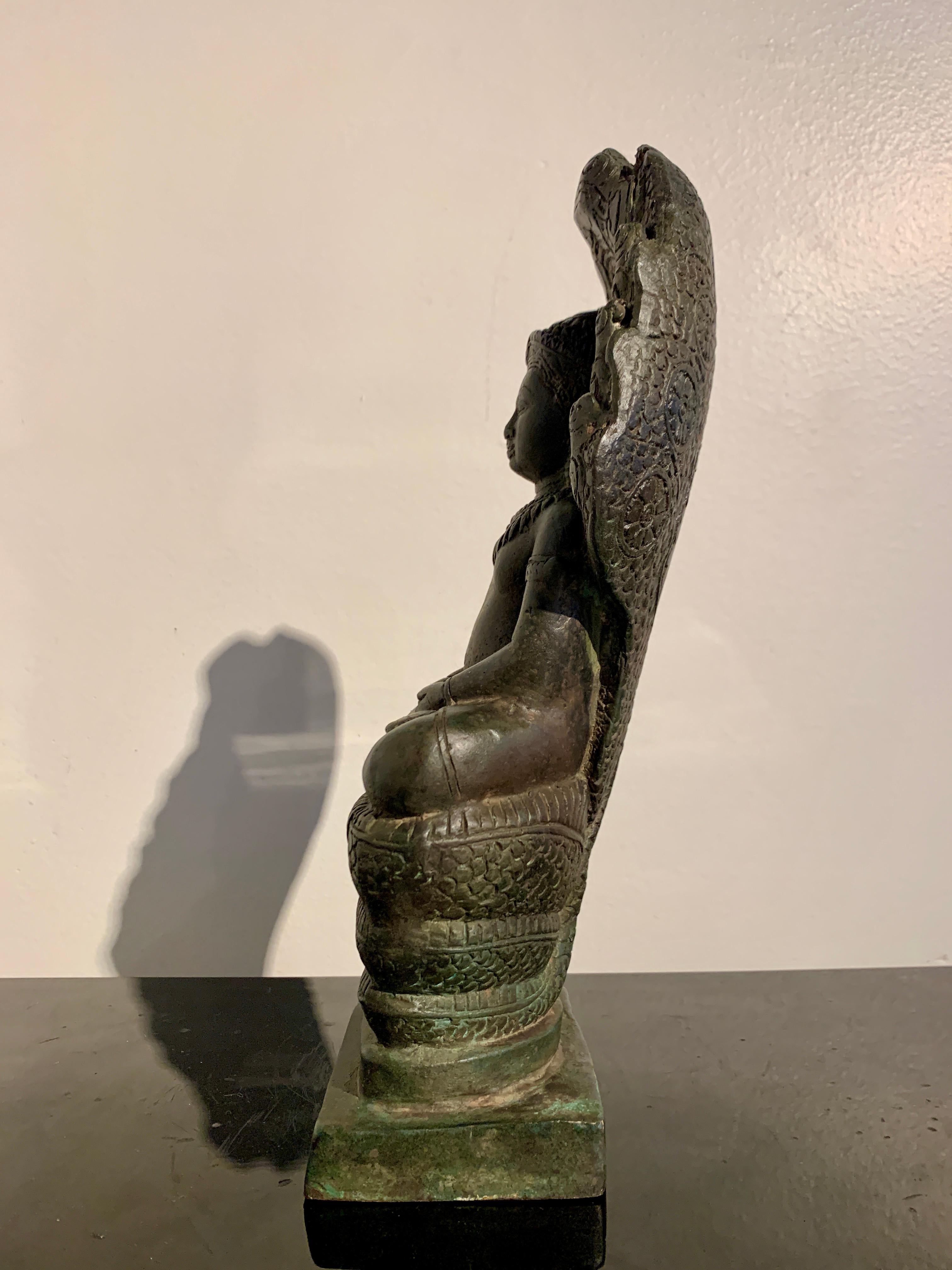 Khmer Cast Bronze Buddha Sheltered by Naga, 19th Century, Cambodia  For Sale 1