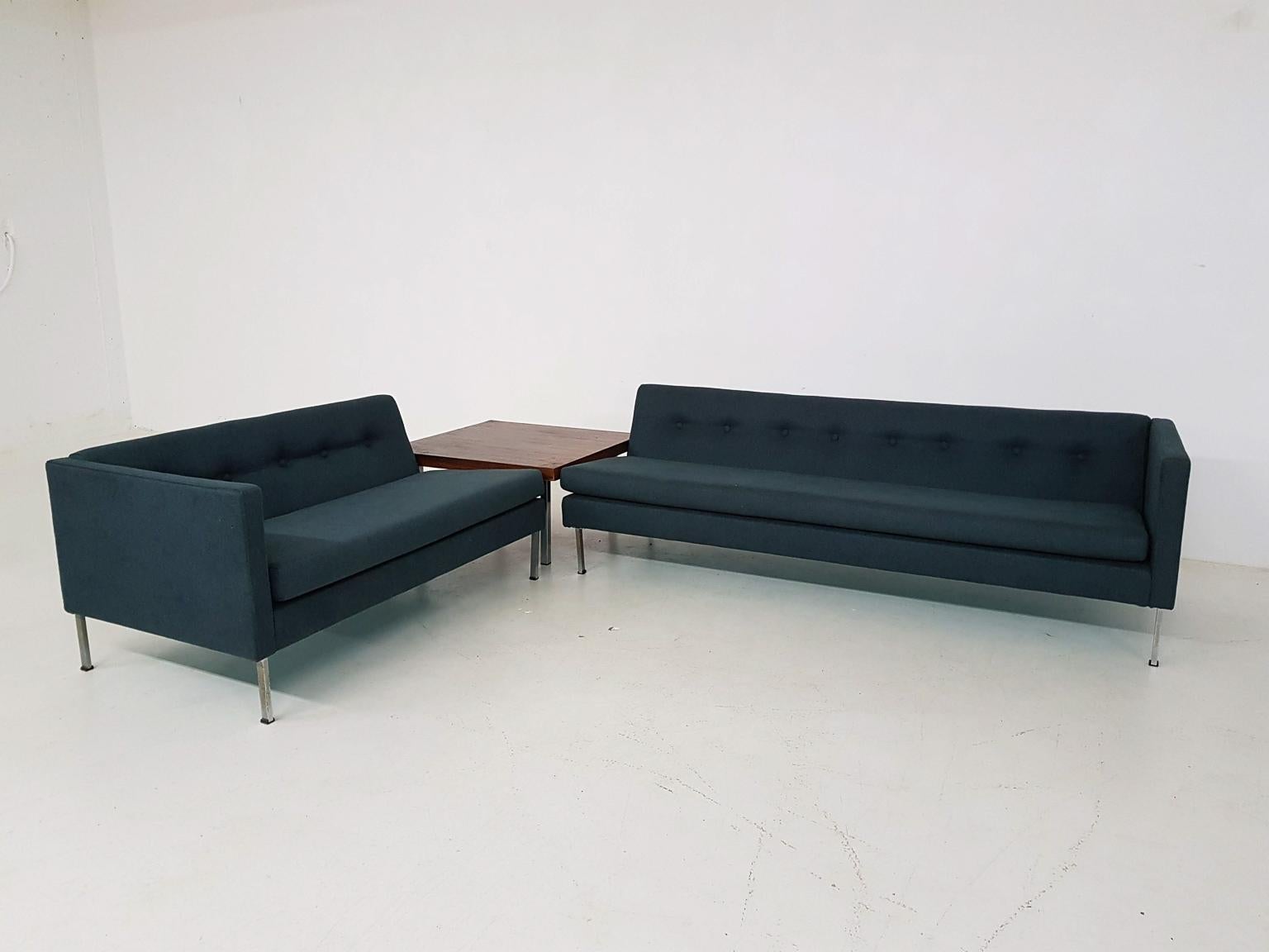 Kho Liang Ie for Artifort model 680-686 sofa with corner or coffee table, the Netherlands 1960s.

A two-seat and a three-seat in new dark green upholstery on metal feet. Comes with a corner table in teak, which could also be used as a coffee table.