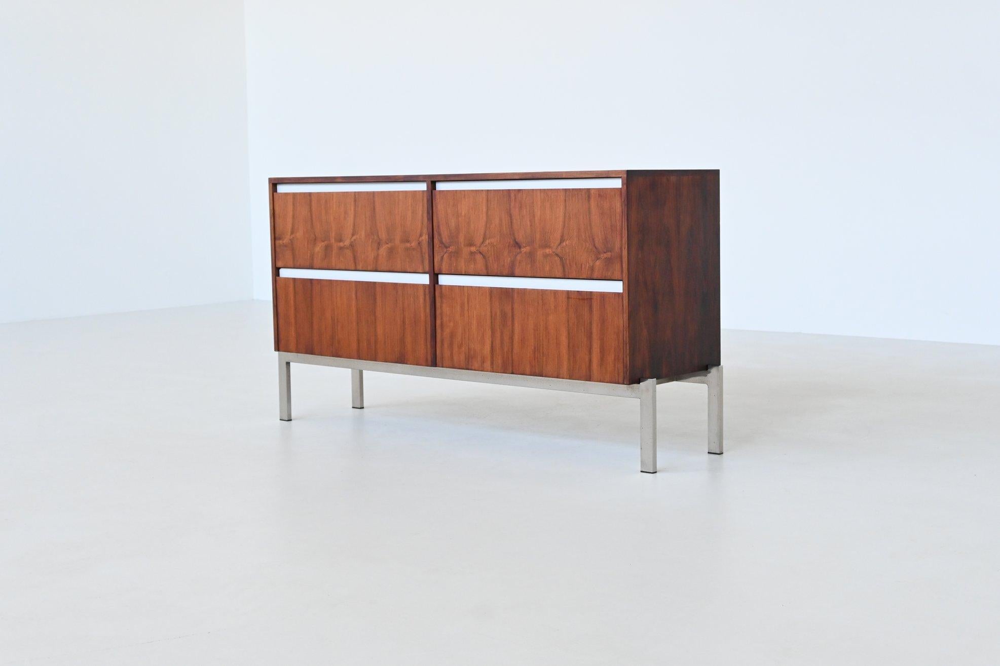 Beautiful shaped modernist sideboard designed by Kho Liang Ie and Wim Crouwel and manufactured by Fristho Franeker, The Netherlands 1957. This fantastic sideboard is executed in amazingly grained rosewood supported by a chrome plated metal frame.