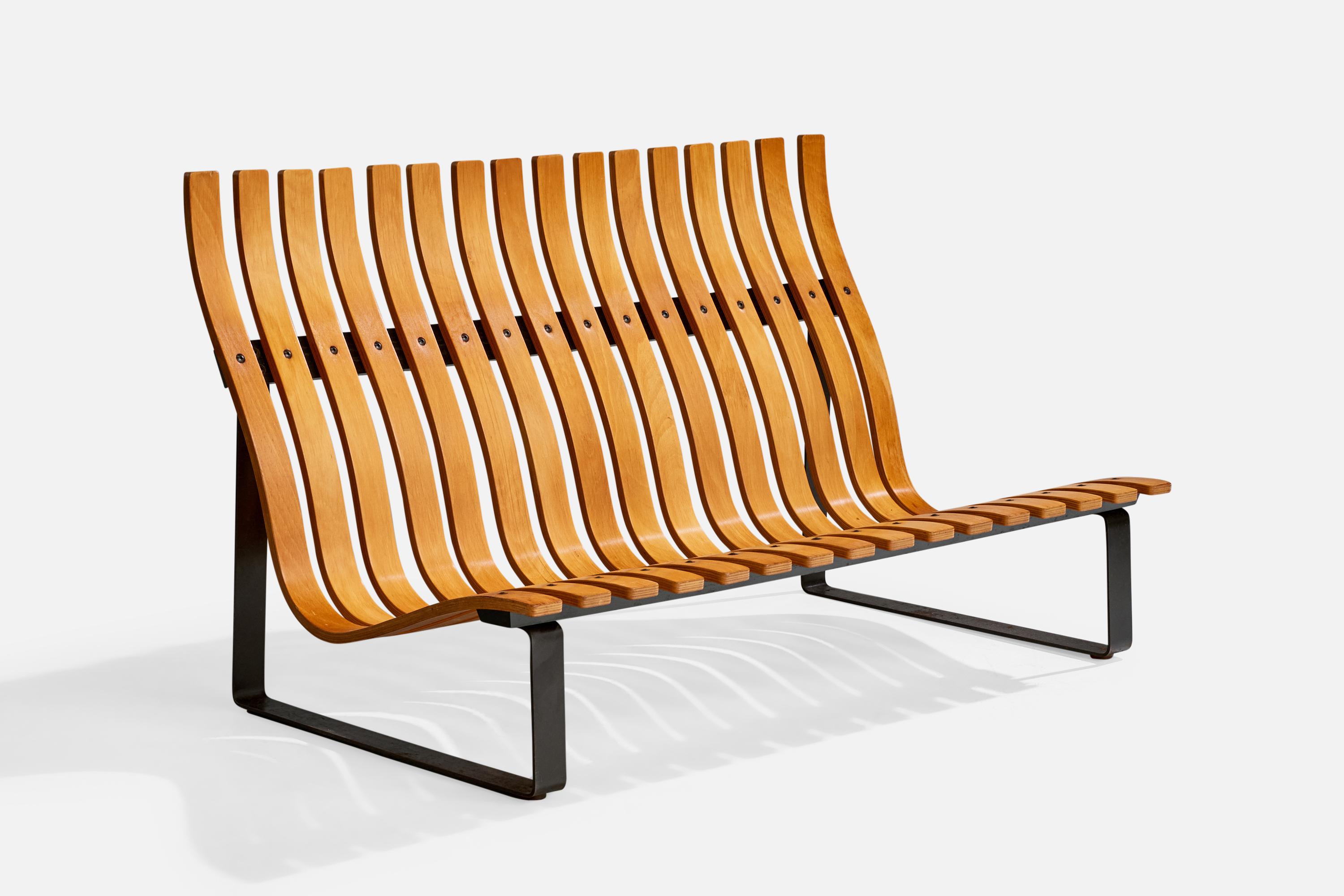 A bentwood and black-lacquered metal bench attributed to Kho Liang Le for Artifort, Netherlands, c. 1960s.

Chip present to wood

Wear consistent with age and use

Overall Dimensions (inches): 33.5
