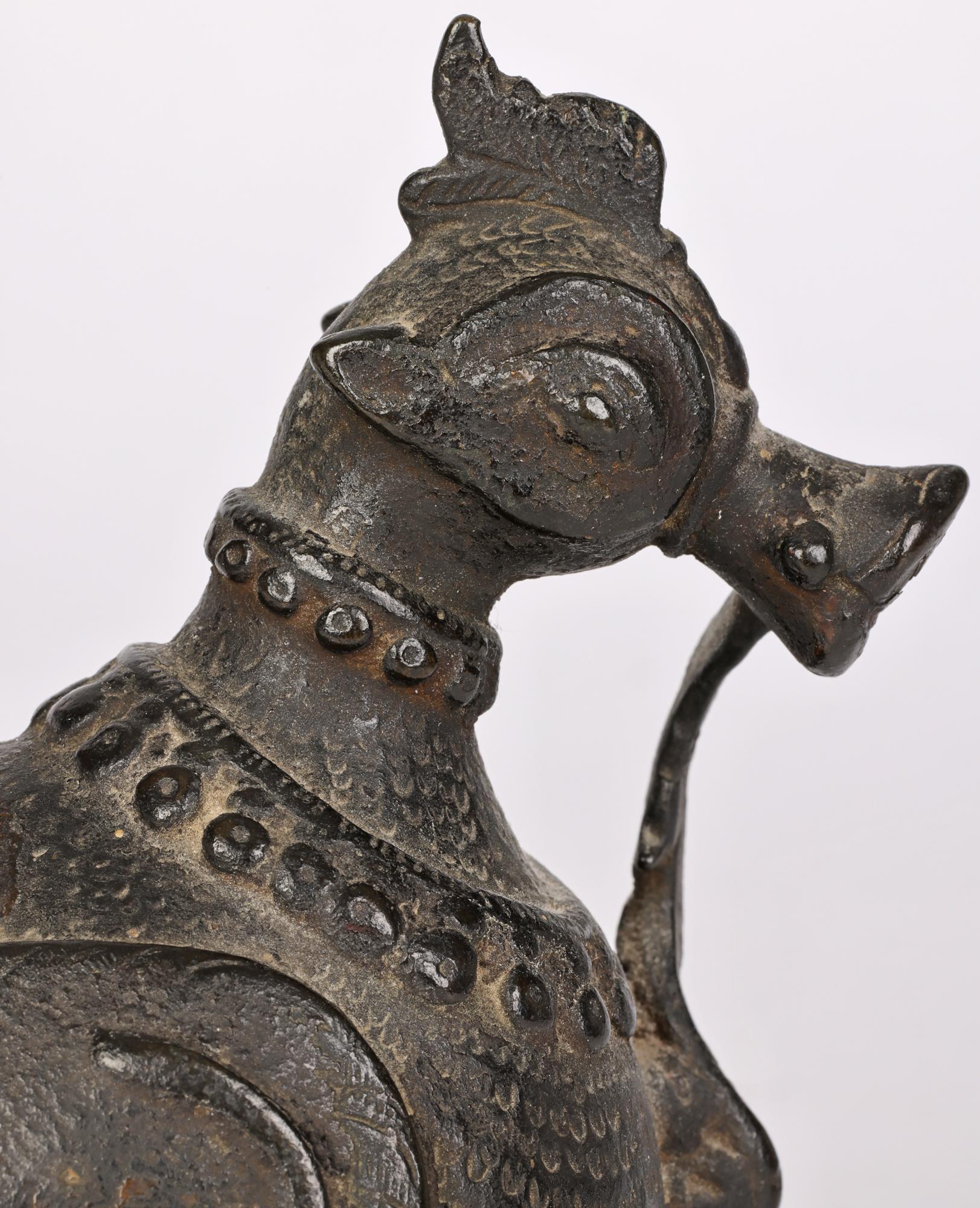 A stylish antique Khond attributed bronzed metal stylized figure of a Hamsa bird dating from the 19th or early 20th century made in Orissa, India. 

The Khonds are an indigenous Adivasi tribal community in India and produce metal sculptures in a
