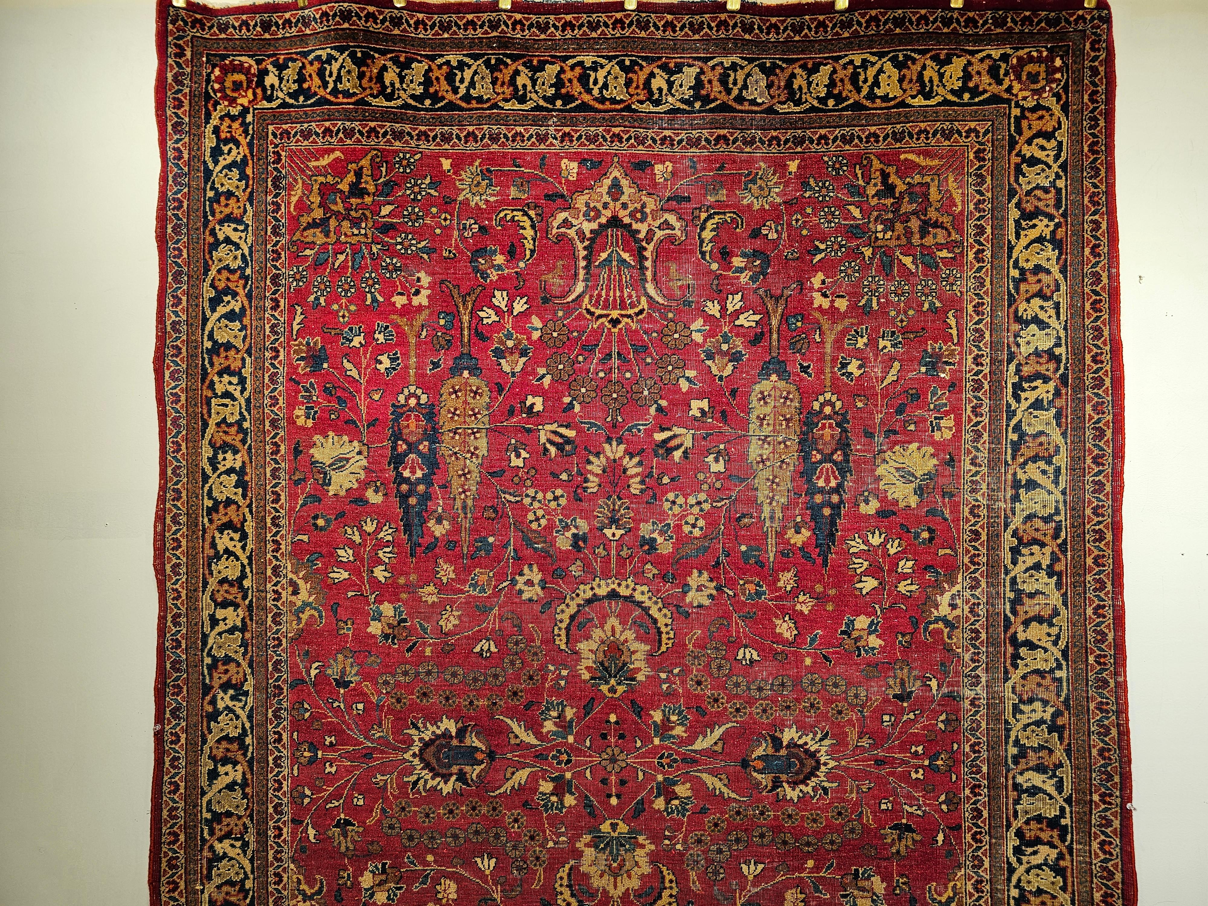 19th Century Persian Khorassan in allover floral design in crimson red, blue, and green.  It has one of the most unique colors and designs in any hand woven rugs from Persia. This Khorassan rug from NE Persia is from the last quarter of the 19th