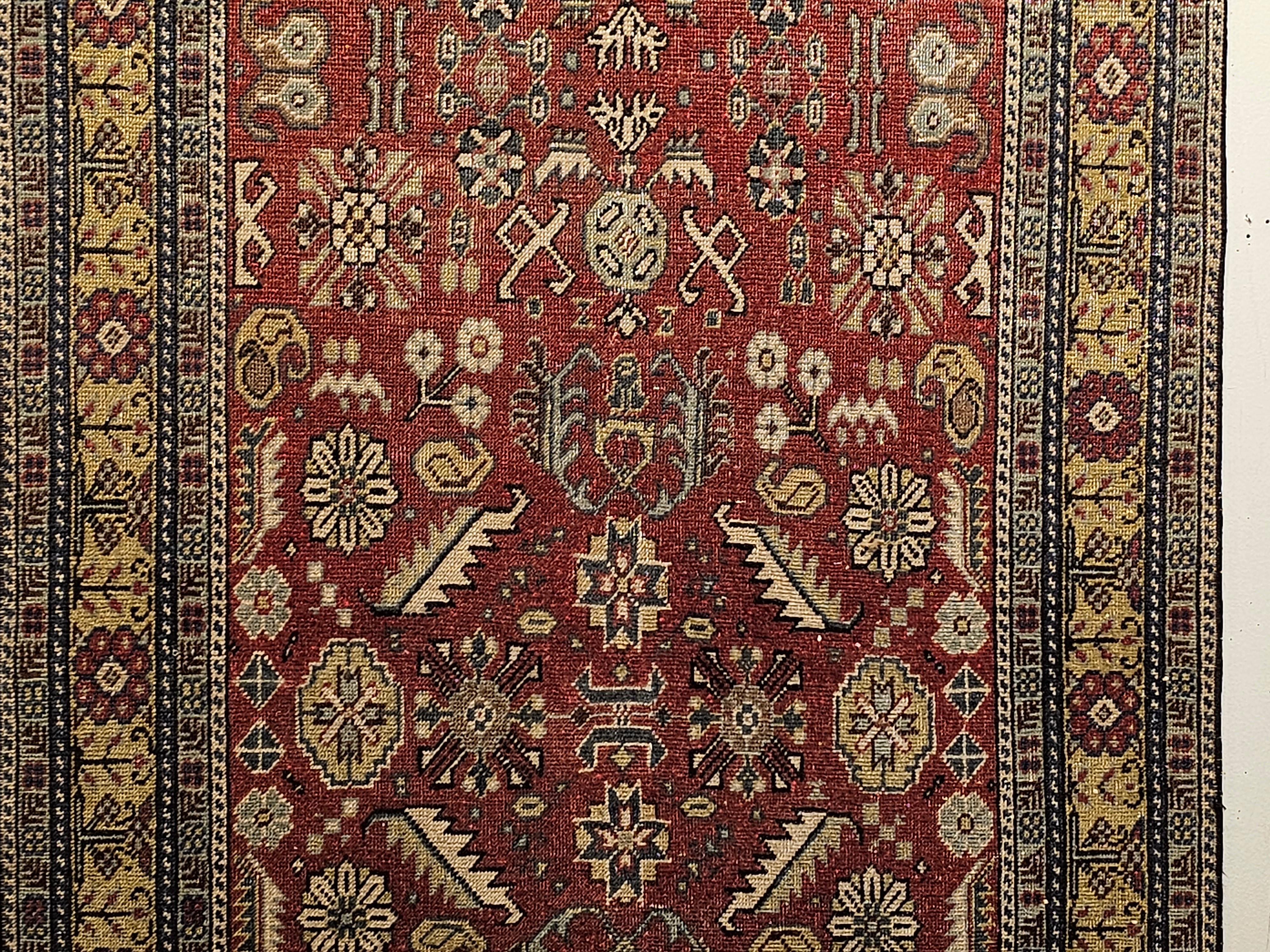 Vintage Khotan Area Rug in Allover Geometric Pattern on Brick Red, Yellow, Ivory In Good Condition For Sale In Barrington, IL