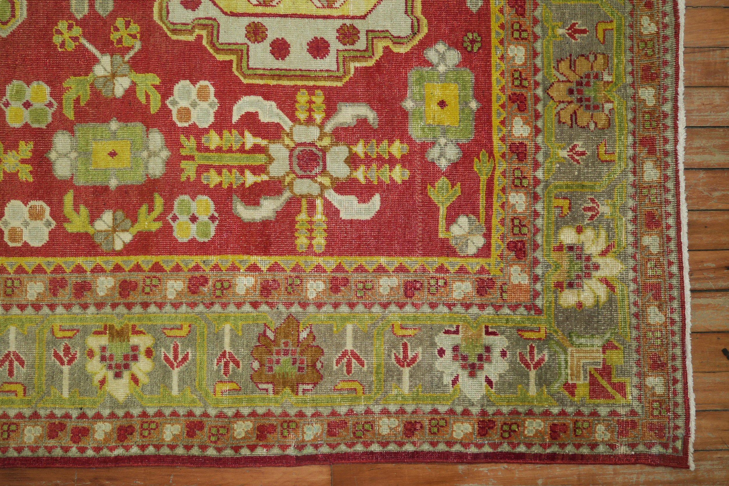 Hand-Woven Khotan Bright Red Green Yellow Antique 20th Century Wool Handmade Oriental Rug For Sale