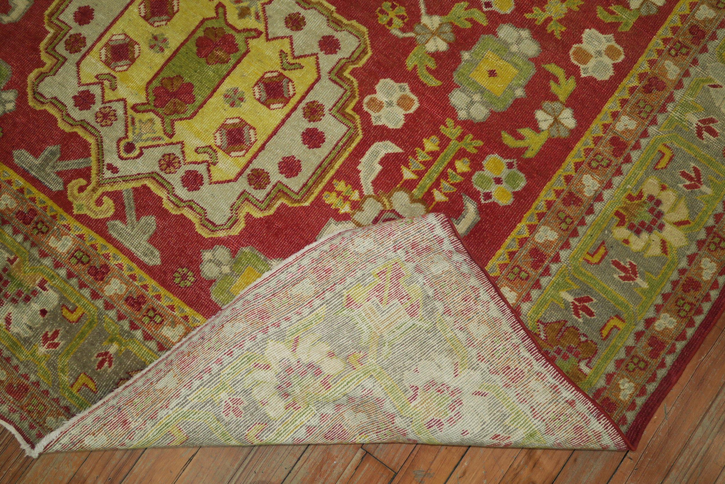 Khotan Bright Red Green Yellow Antique 20th Century Wool Handmade Oriental Rug In Excellent Condition For Sale In New York, NY