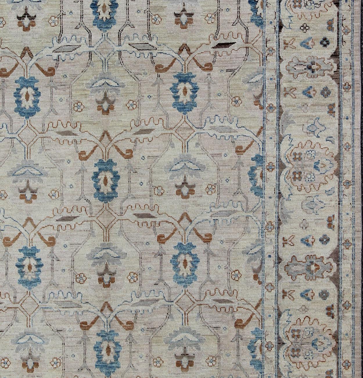 Light Color Khotan design rug with geometric motifs in Blush, Brown, Tan, and Blue, rug MP-1703-7565 country of origin / type: Afghanistan / Khotan

This Khotan features a geometric all-over design flanked by a repeating pattern in the border. The