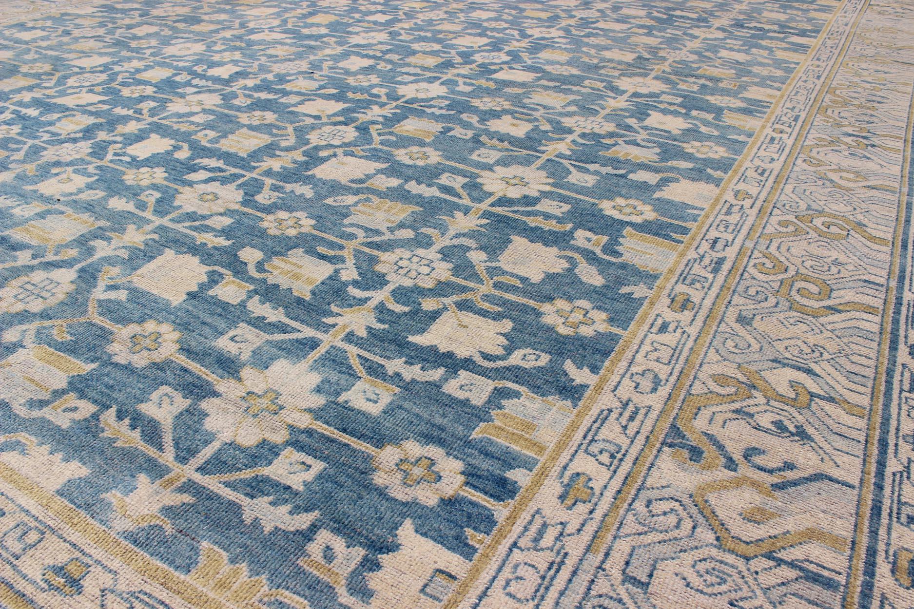 Khotan Design Rug with All-Over Sub-Geometric Pattern in Blue, Tan & Gold In Excellent Condition For Sale In Atlanta, GA
