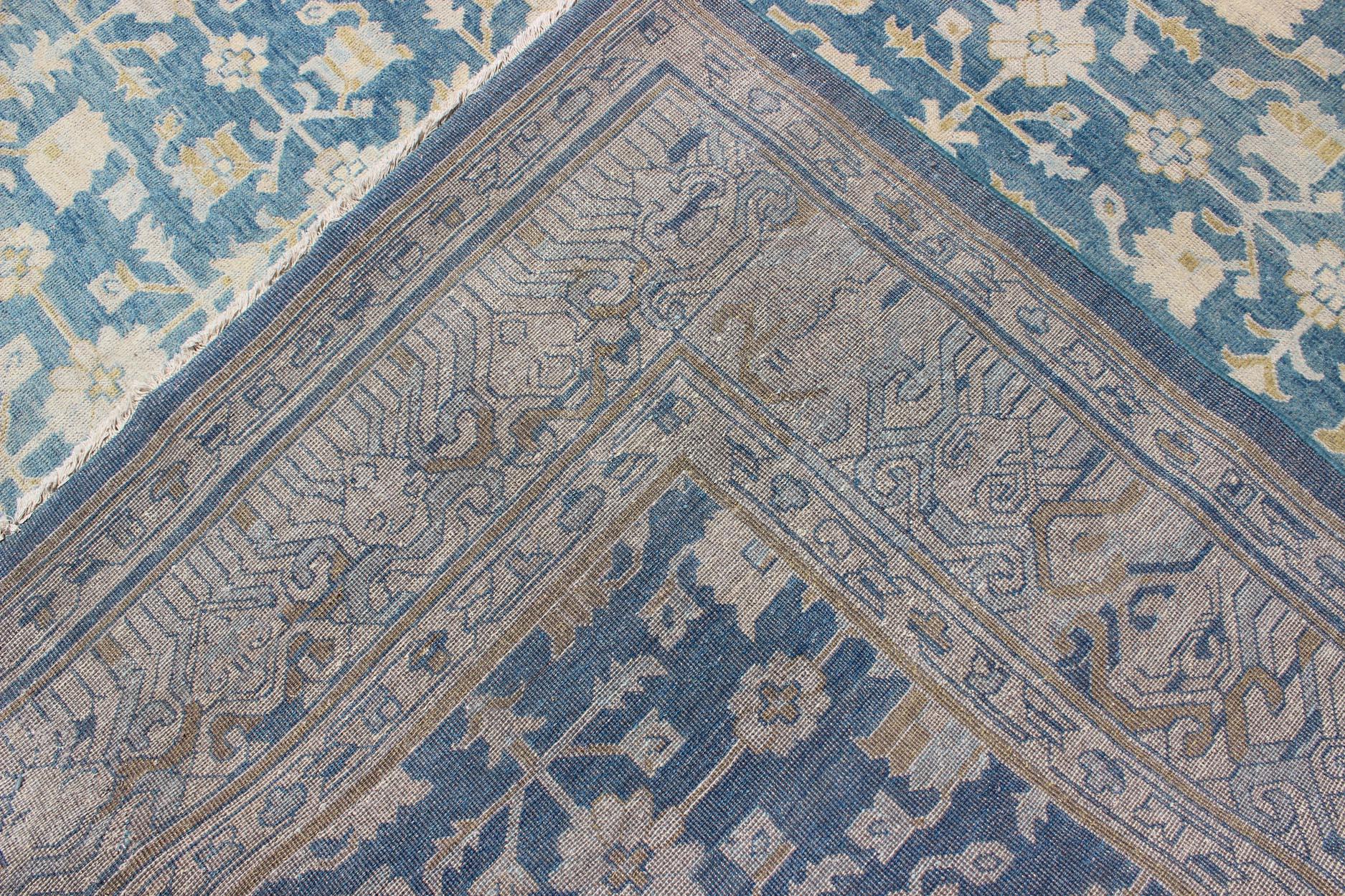 Contemporary Khotan Design Rug with All-Over Sub-Geometric Pattern in Blue, Tan & Gold For Sale