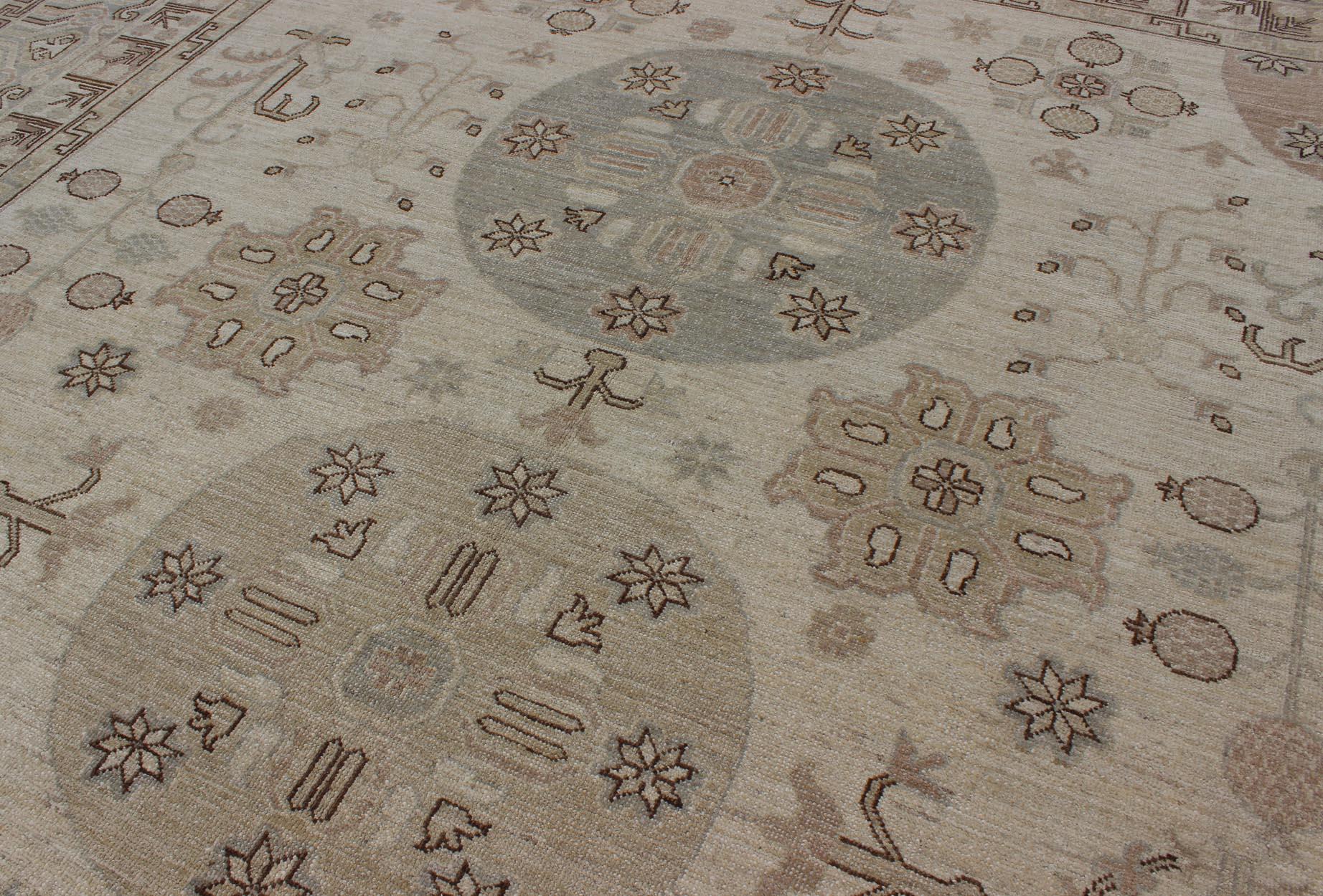 Khotan Design Rug with Circular Medallions, in Muted Earth Tones In Excellent Condition For Sale In Atlanta, GA