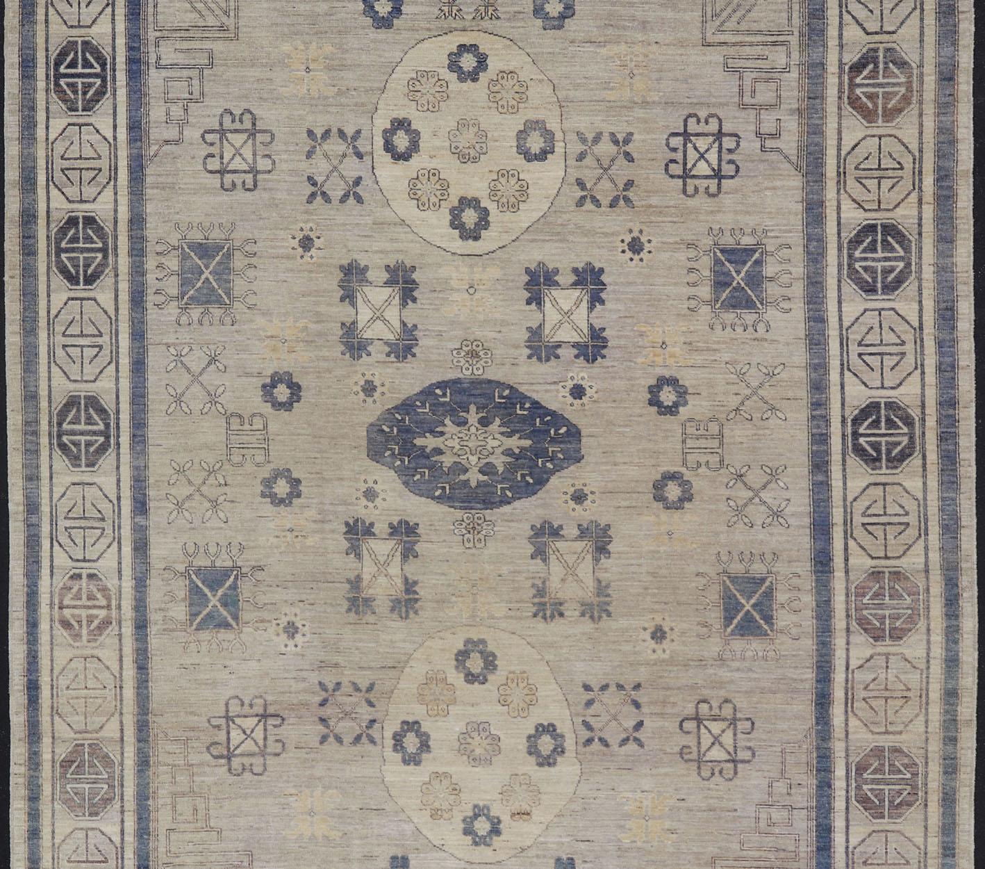 Afghan Khotan Design Rug with Geometric Medallions in Royal Blue and Cream For Sale