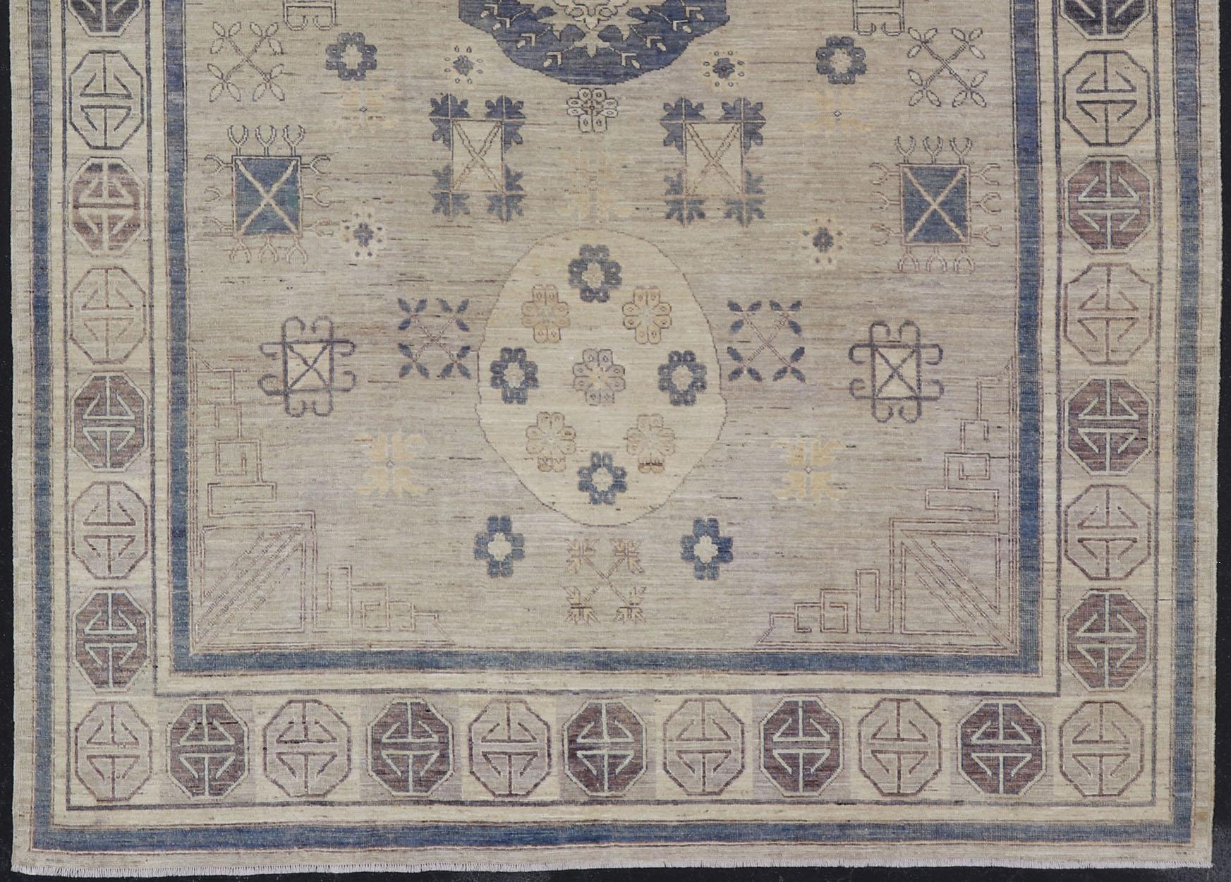 Hand-Knotted Khotan Design Rug with Geometric Medallions in Royal Blue and Cream For Sale
