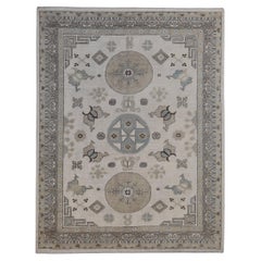Khotan Pattern Ivory, and Blue Toned Wool Rug 5'10''x7'6''