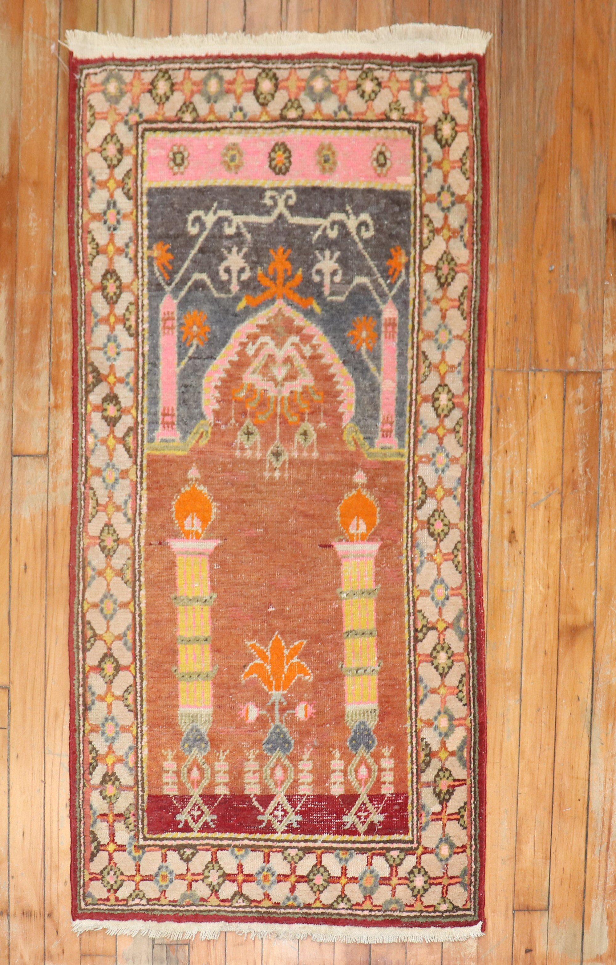 Rare Prayer niche pattern Khotan small size rug from the early 20th century.
we have never seen an east Turkestan Khotan rug with this prayer design. Purchased from a collector in Washington DC.

Measures: 2'1'' x 4'1''.