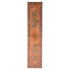 Tapis Khotan motif dragon couleur saumon