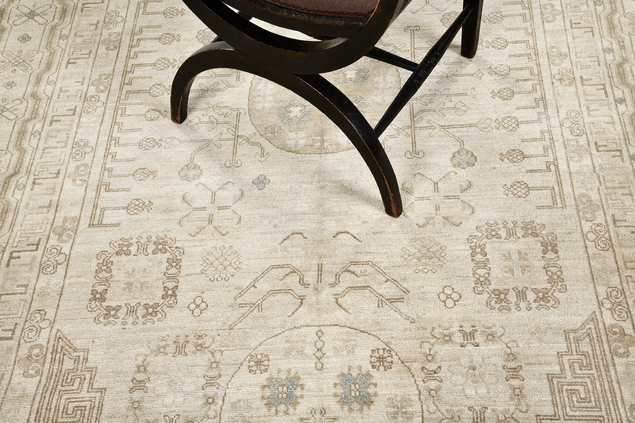 An elegant revival of Tabriz rug in Rapture Collection that elegantly establishes superior intricacy through botanical all-over pattern of the blooming palmettes, stylized florals connected by graceful vines. Flanked by inner and outer floral guard
