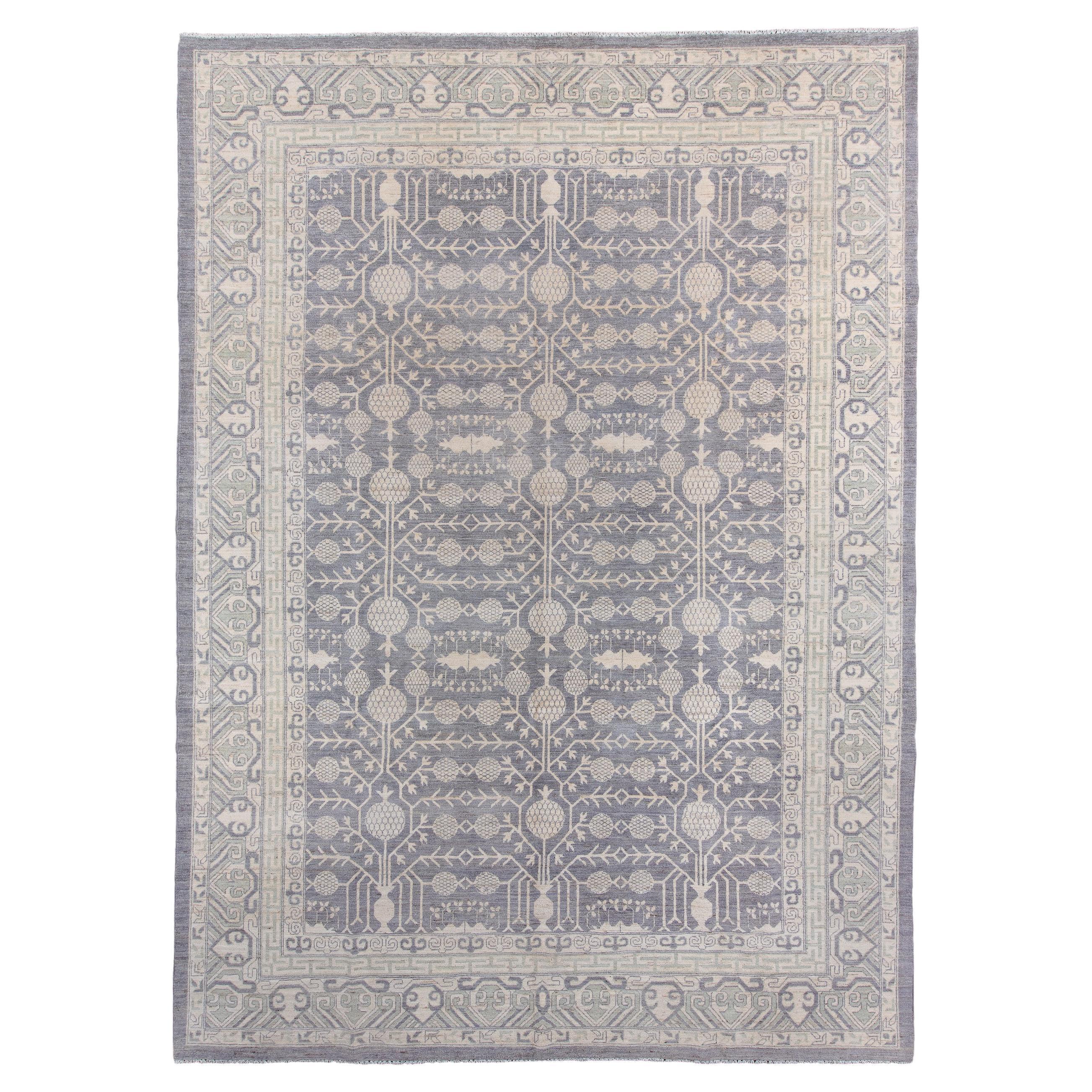 Khotan Style Rug with Coral Background and Blue Designs For Sale