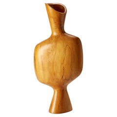 Ki 0.1, una scultura astratta in legno di prugna di Donald Baugh