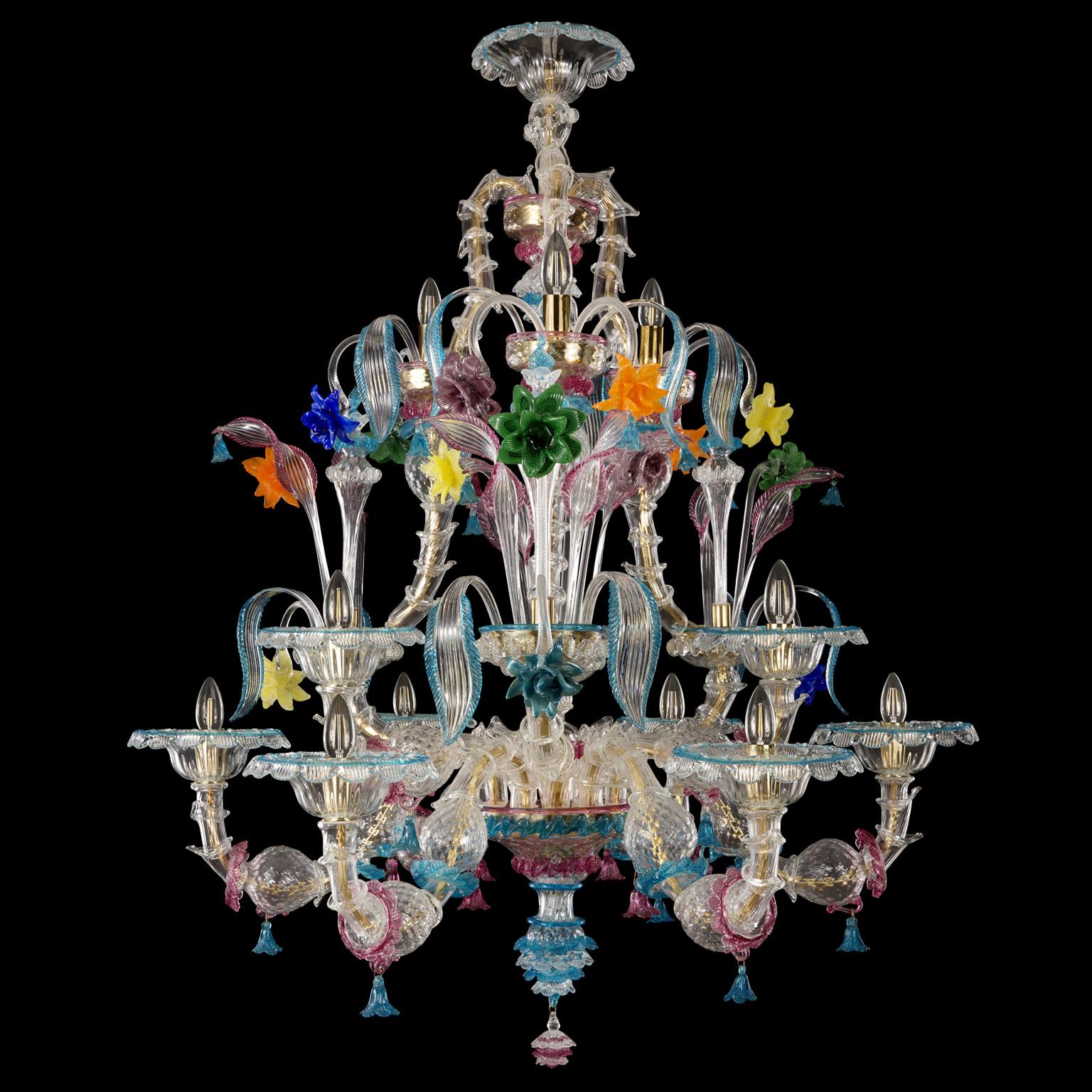 Kia Ora chandelier 6+3+3 lights, clear Murano glass with colorful details by Multiforme.
Kia Ora is the combination of the traditional Venetian structure with gaudy colors. The glass chandeliers Kia Ora are peculiar lighting works, lively and