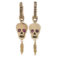 KIAIA 18kt Gold Skull Earrings with Rubies and Black Diamonds