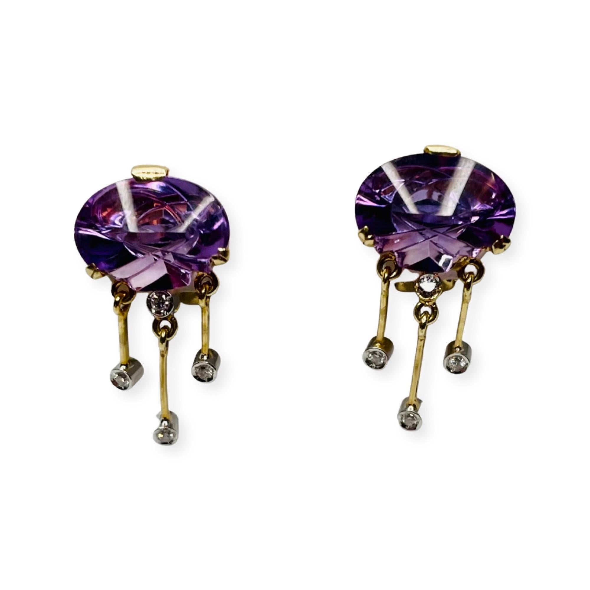 Kian 14K Yellow and White Gold Laser Cut Amethyst and Diamond Earrings. With the diamond dangles they are 17.15 mm long. The Amethysts are 3.38 mm by 10.24 mm. There are 6 diamonds, bezel set, for a total diamond weight of 0.10 carats. They are full