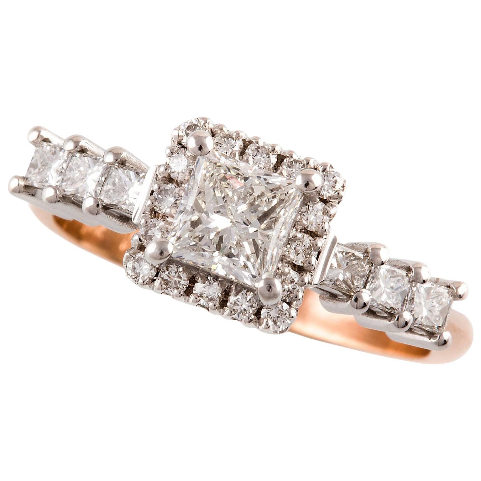 Piazza Diamond Ring

This gorgeous vintage style ring with 18ct white gold setting and rose gold band is set with a combination of princess and round brilliant cut diamonds.

Princess cut diamond: G colour, SI clarity, 0.72ct, 4.95 x
