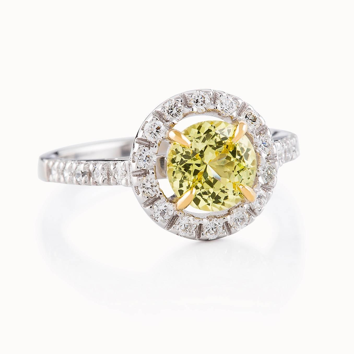 Giallo Halo Ring

This stunning dress ring in 18ct white gold features a beautiful yellow sapphire set in 18ct yellow gold which is complimented with a halo of petite white diamonds and diamonds on either side of the setting.

Round faceted
