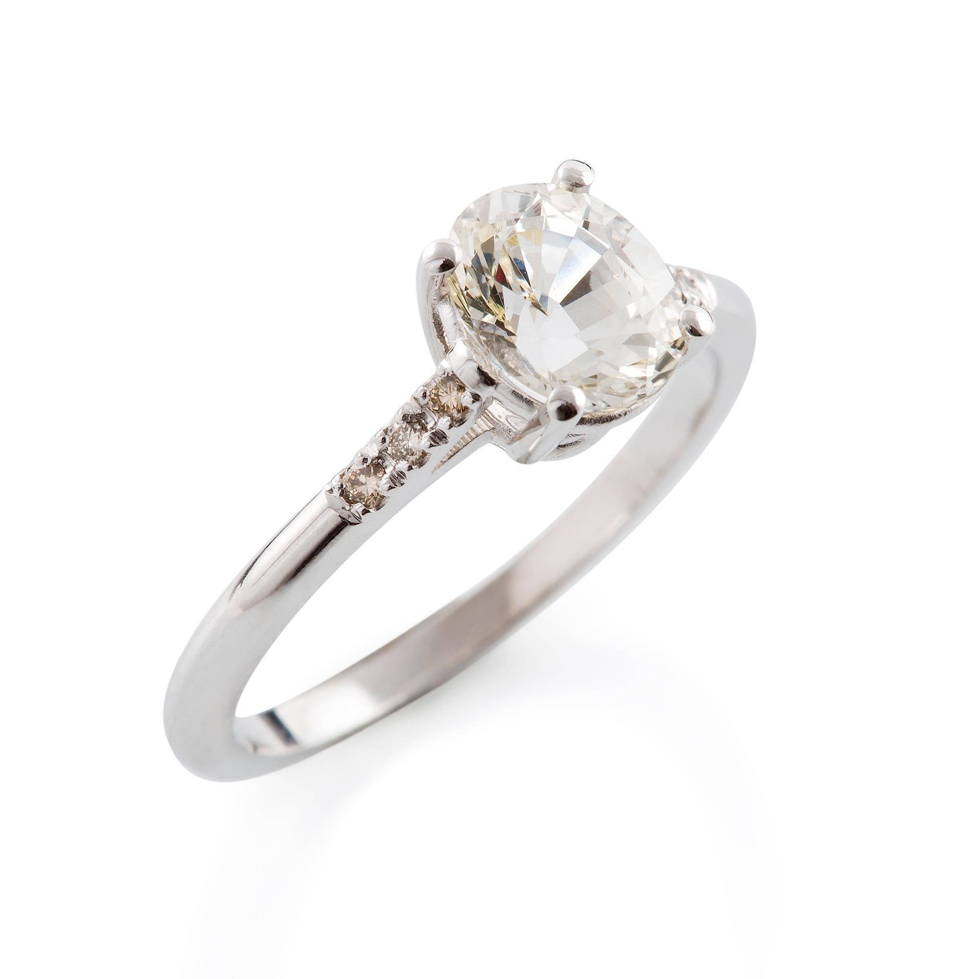 
Verde & Bianca Ring

Simply charming! This 18 carat white gold ring is set with a beautiful natural unheated oval cut white sapphire which has petite finest champagne  diamonds on either side.

Oval  faceted sapphire: White with a little tinge of
