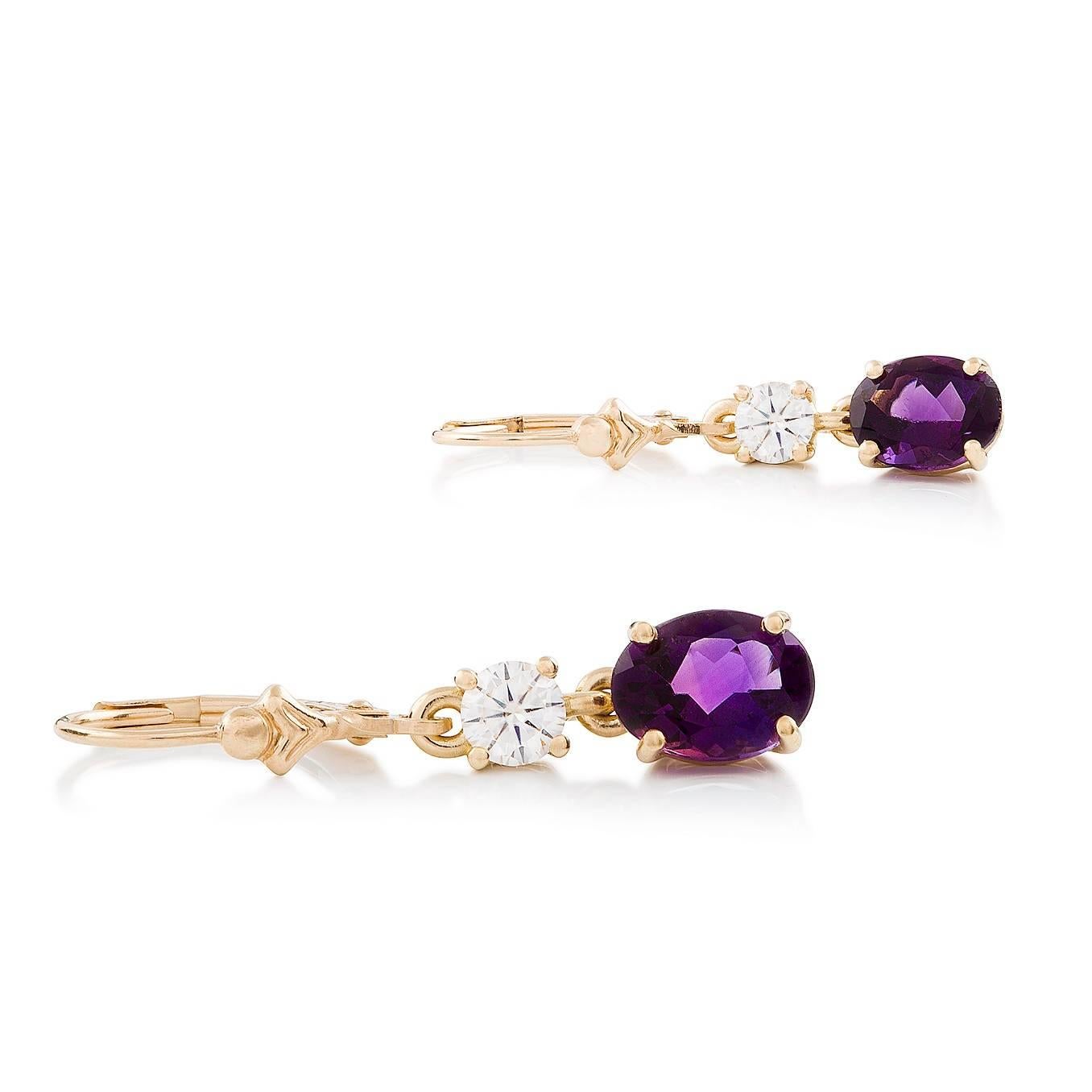 Ametista Diamante Earrings

These gorgeous earrings in 18ct yellow gold feature a pair of lovely amethysts each suspended from a petite finest white diamond and ultra-safe lever back earring findings.

Oval faceted amethysts: medium purple colour,