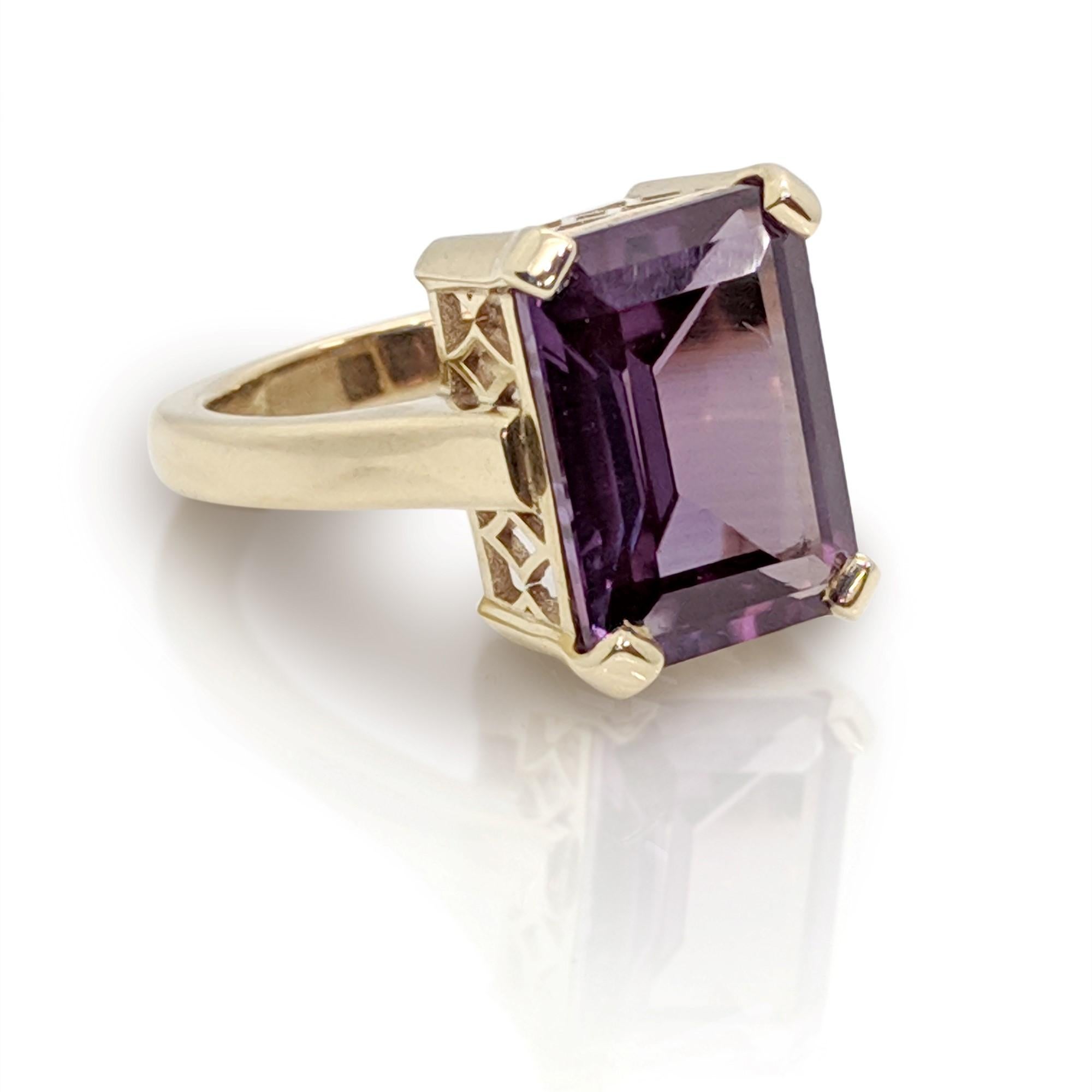 Art Deco Style Emerald Cut  Amethyst Ring

This gorgeous hand-crafted is set with a large and attractive Bluish- purple Lab grown Alexandrite in 4 claws setting. The ring is made of yellow gold.

1 x  Emerald Cut  Amethyst , Colour is dark blue in