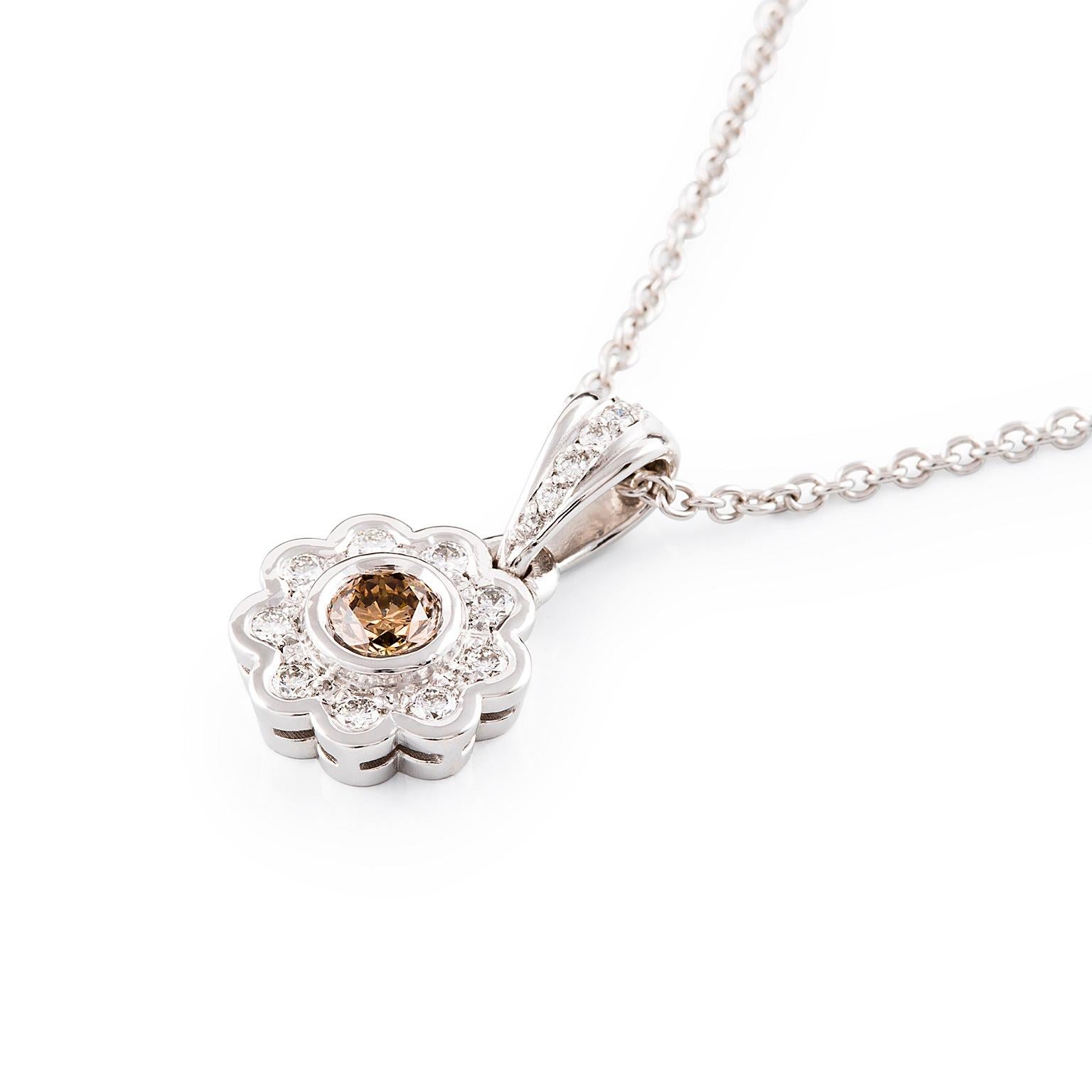 Halo Necklace

This gorgeous petite pendant features a stunning fancy Champagne(Golden brown) diamond surrounded by a halo of white diamonds. The fancy bail has a Bead  set diamonds and is threaded upon the 18 carat link chain.

Round brilliant cut