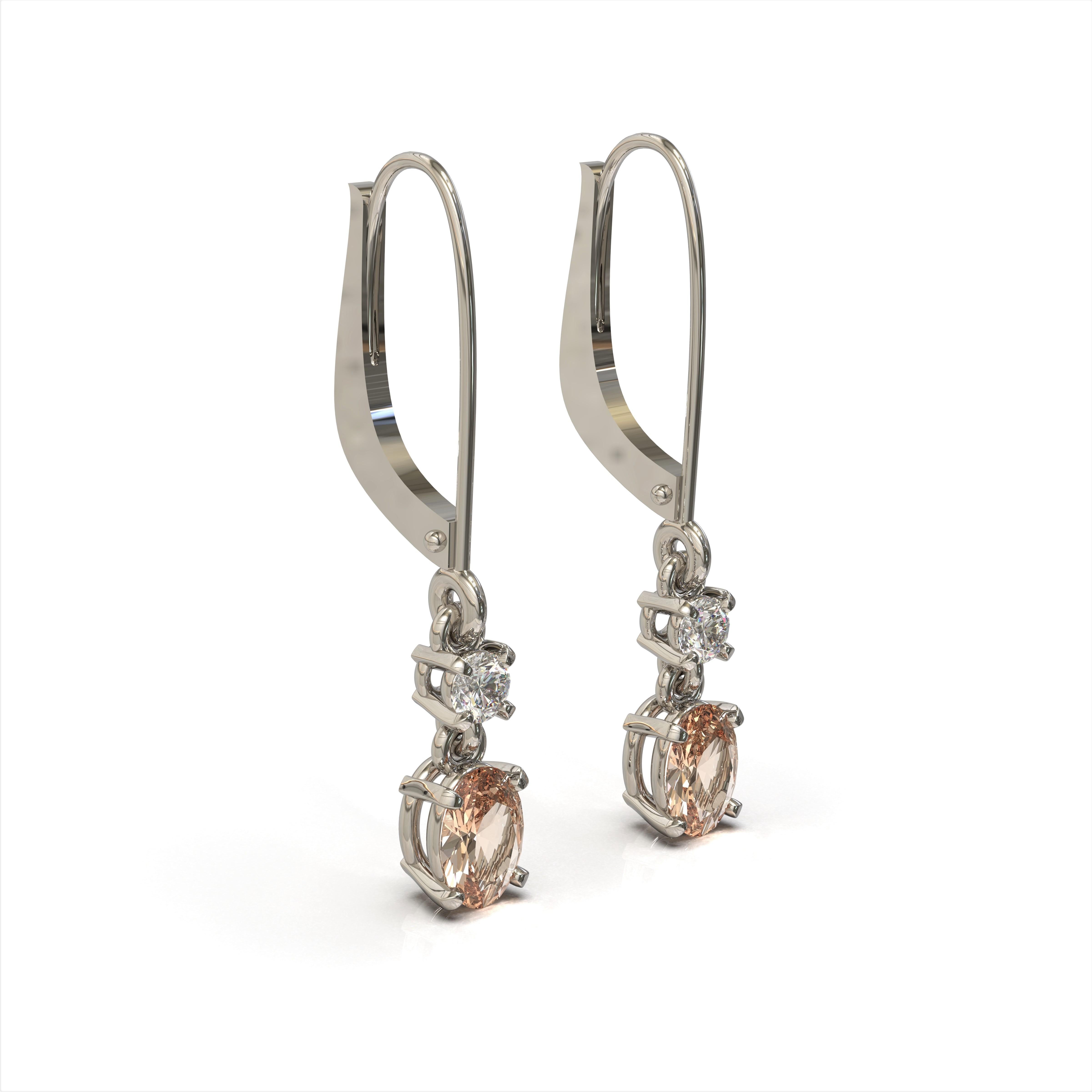 Orecchini Di Diamante Morganite

These gorgeous earrings in 18 carat white gold feature a pair of lovely morganites each suspended from a petite finest white diamond and ultra-safe lever back earring findings.

Oval faceted Morganites: 0.86 carat