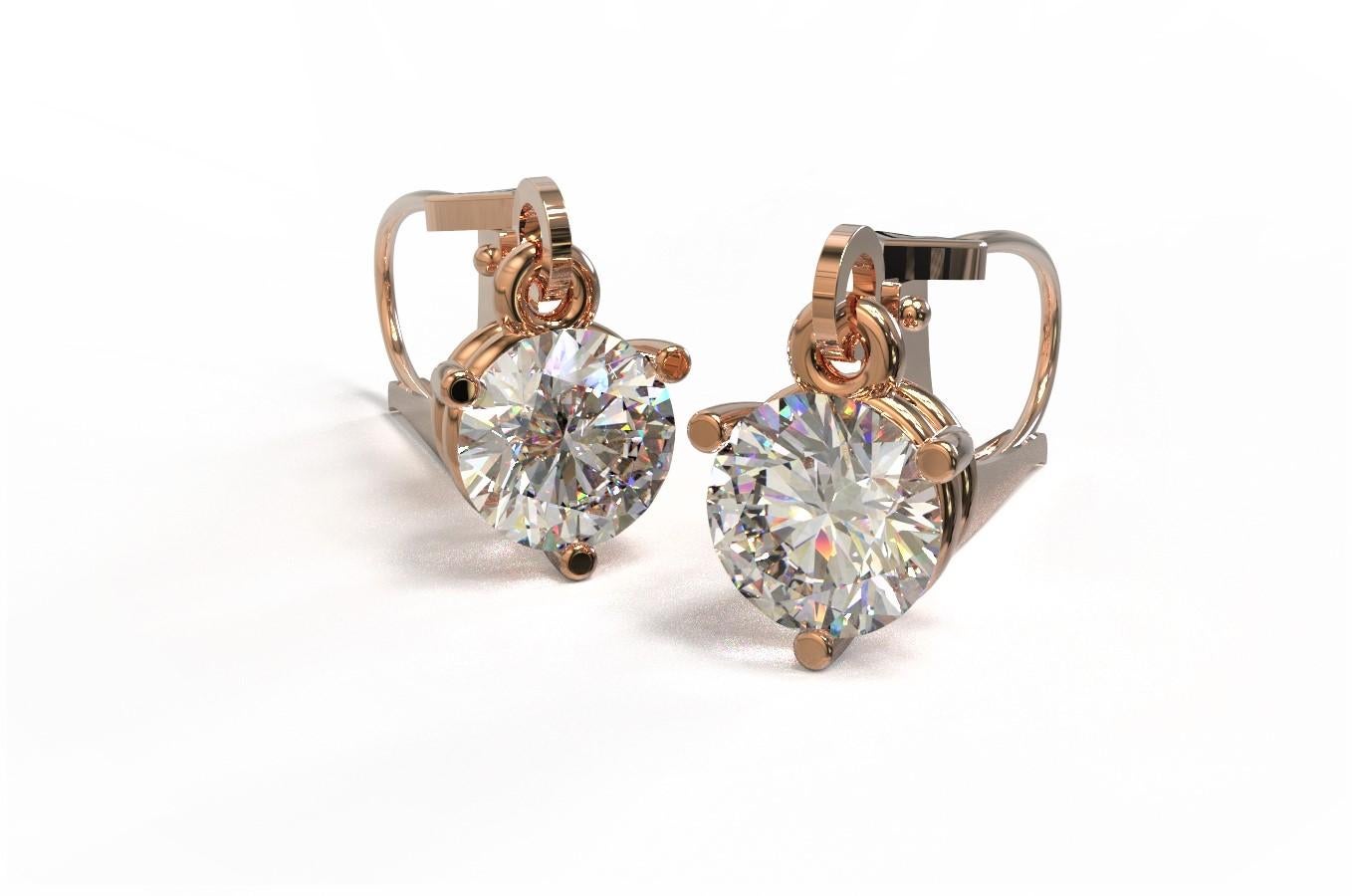  Diamante Rosa Earrings


The perfect complement to any lady. These gorgeous diamond drop earrings are featured a pair of round brilliant cut diamond. Theses gemstones are set in the three prongs setting with the continental hooks.  simple and