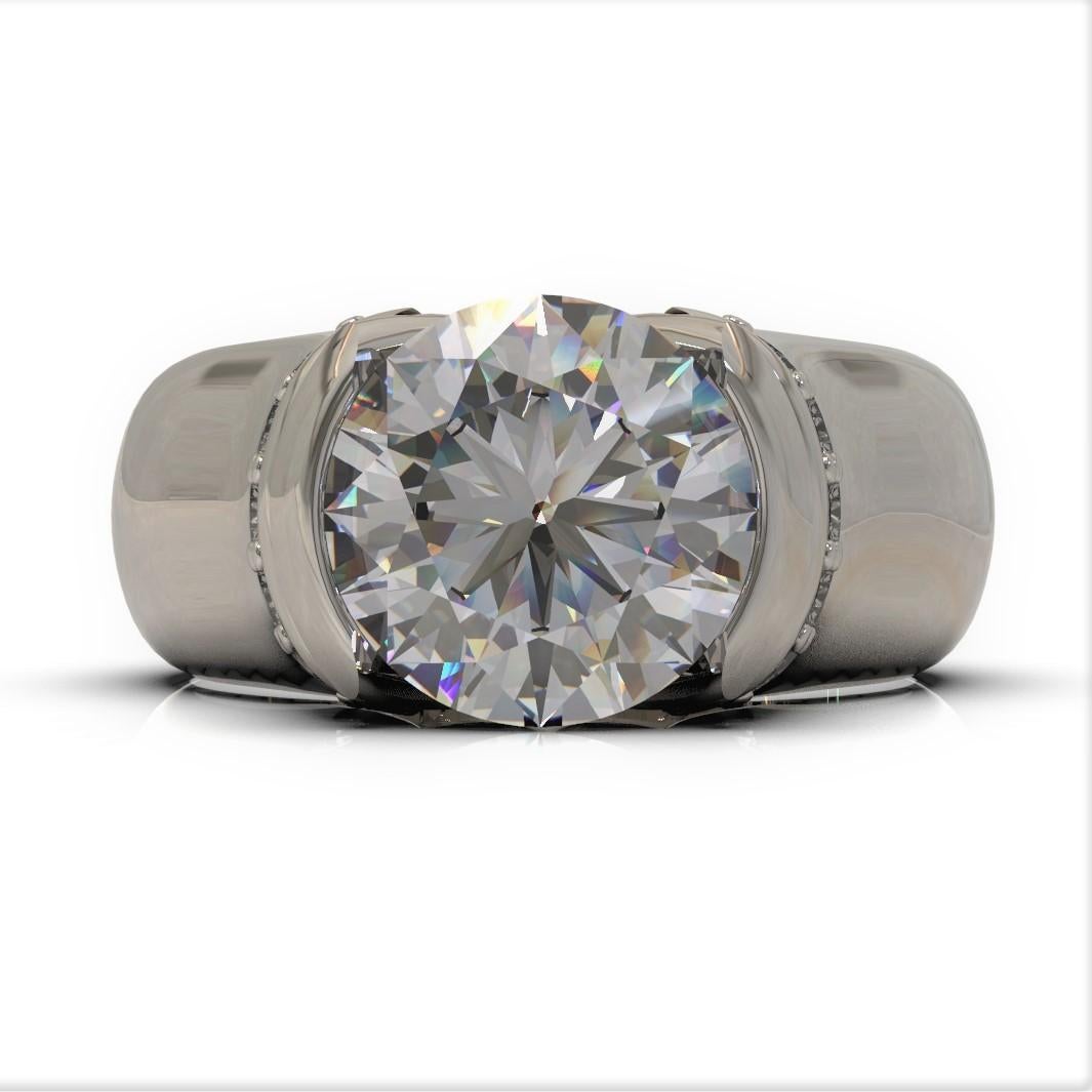 Wide Diamond Ring

This eye-catching organic shape platinum engagement ring features a large white brilliant cut diamond and 10 small diamonds.  

Round brilliant cut diamond: 1.85 Carat GIA Certified G colour, SI2 clarity 7.95 x7.97 x 4.81 MM
Round