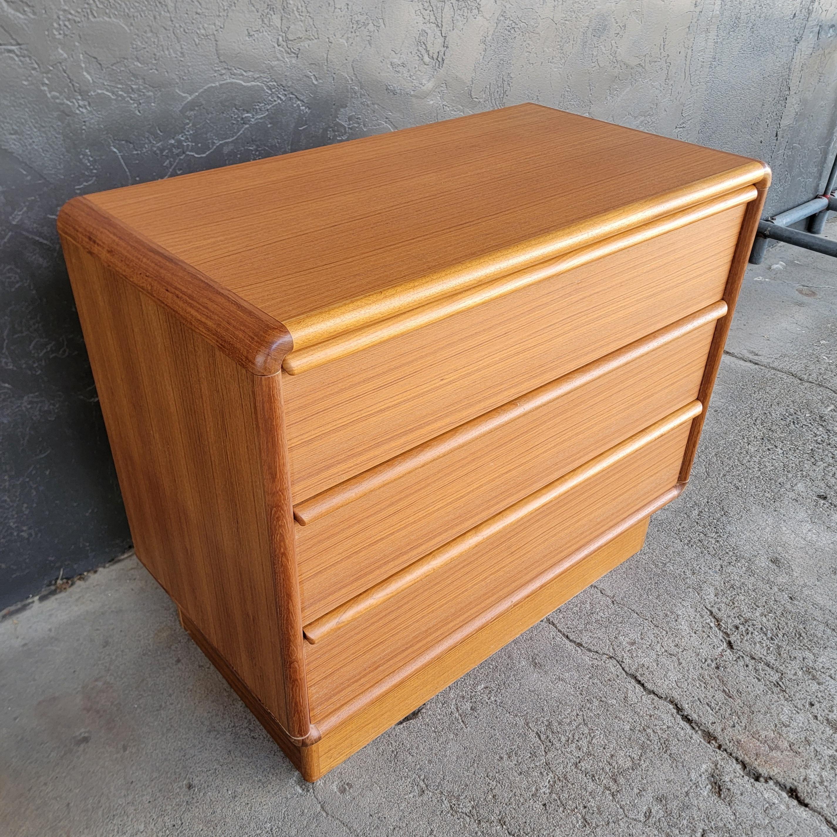 Fine teak Danish Modern 3 drawer dresser by Kibaek Mobelfrabrik, Denmark. Excellent original condition and finish. Rounded corners. Drawers glide effortlessly.  Dovetail construction. Retains paper label 