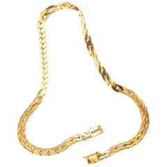 KIBRA Halskette aus massivem 14K Gelbgold mit geschwungener Kette