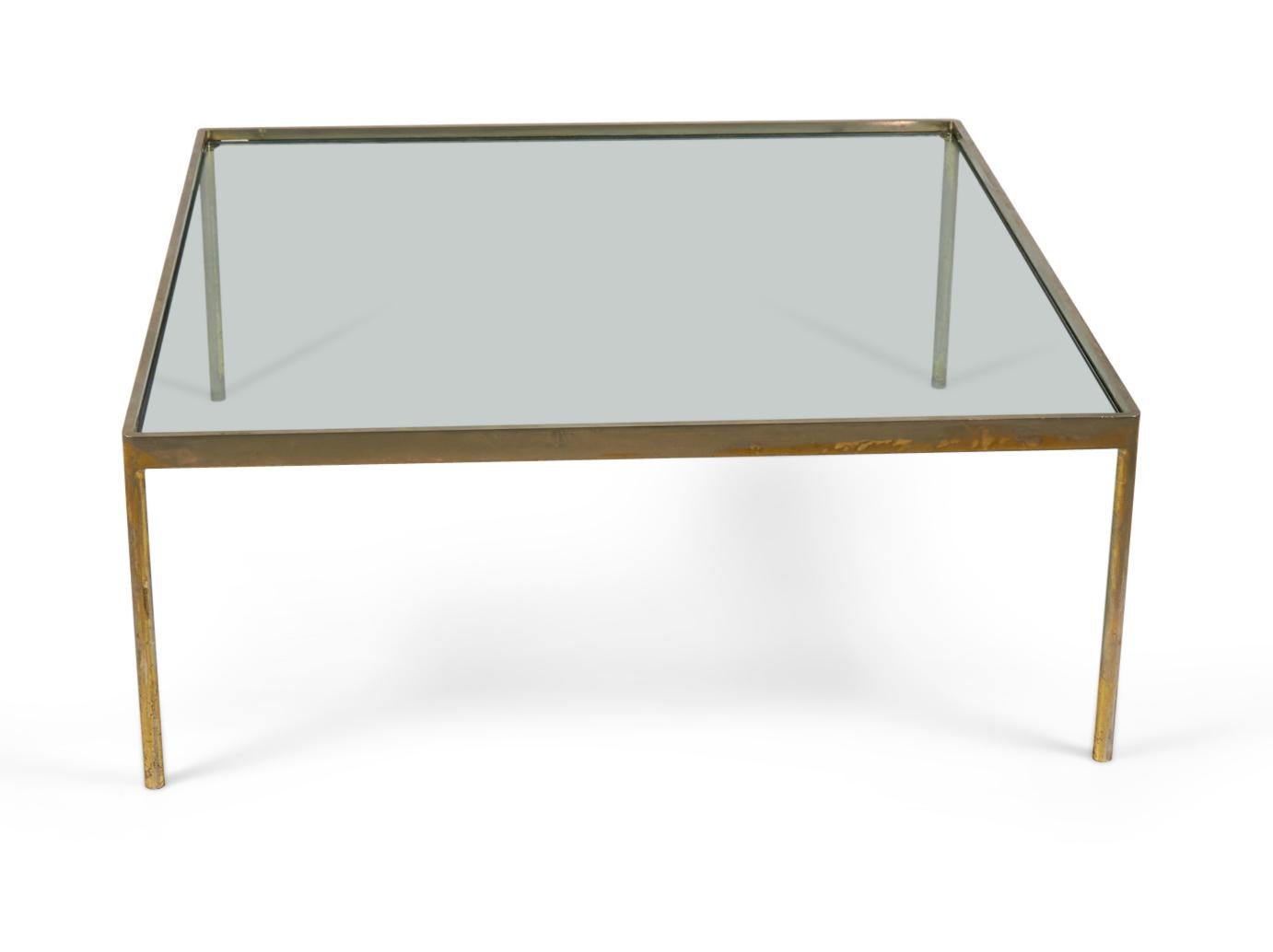American International Style (circa 1960) square polished nickel coffee / cocktail table frame with an inset glass top. (KIBREL S. TERRY FOR SCOPE)
