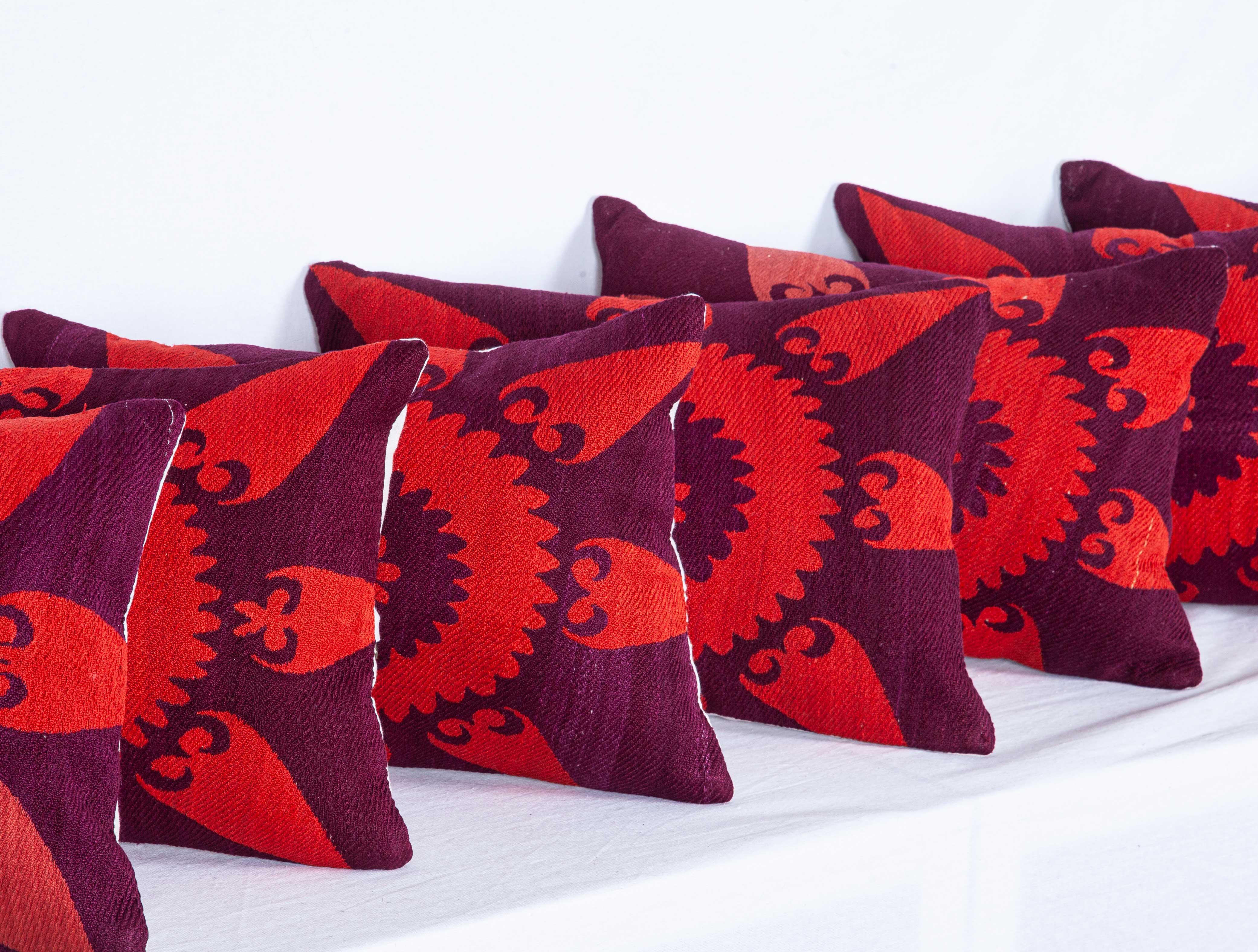 Embroidered Kidney Pillows Fashioned from an Early 20th Century Silk Samarkand Suzani For Sale