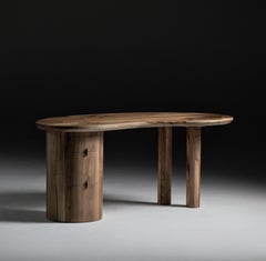 Escritorio con forma de riñón en nogal by Jonathan Field
