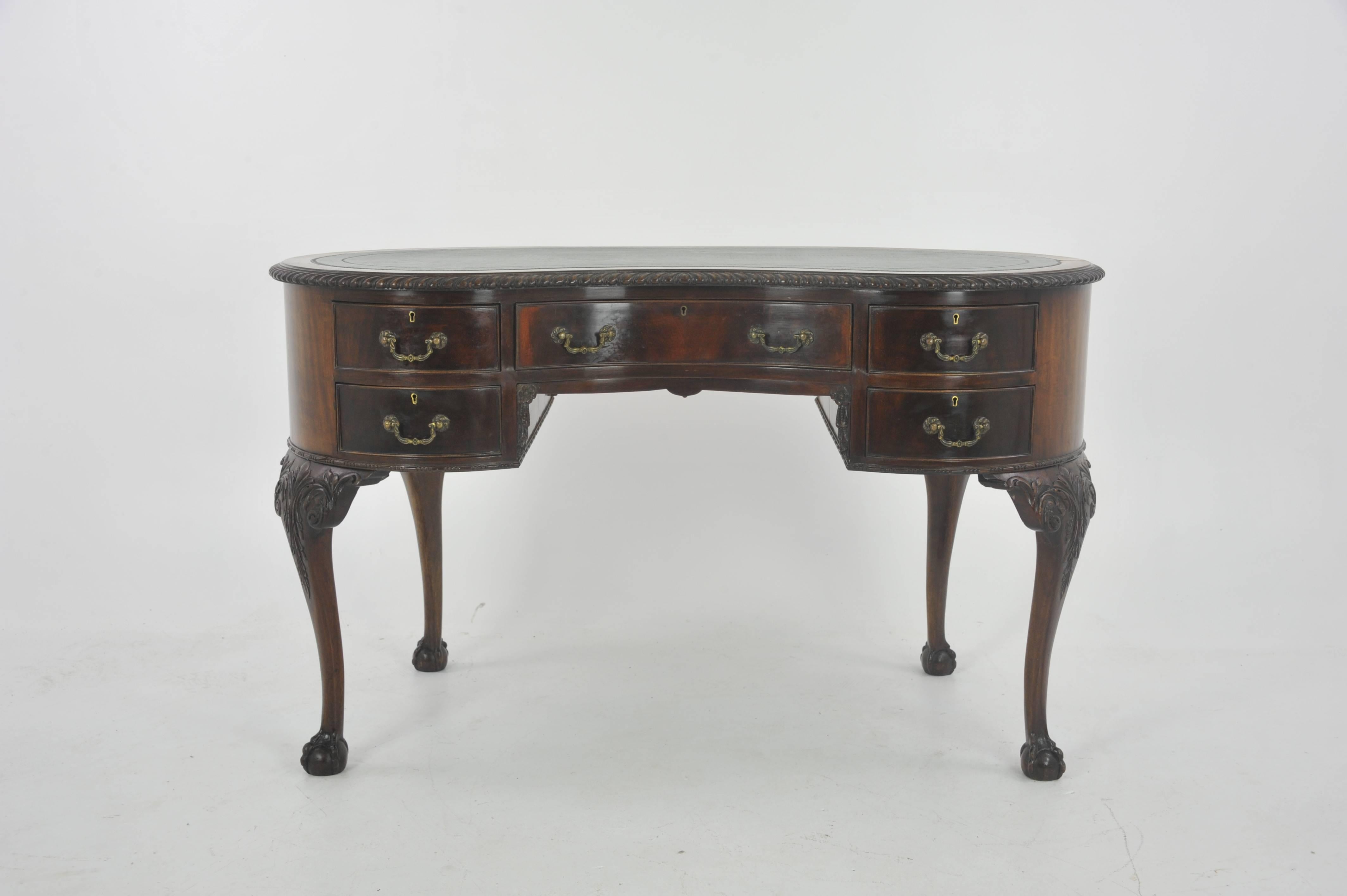Kidney shaped desk, Walnut desk, Edwardian writing table, Scotland 1910, B967

Scotland 1910
Solid Walnut
Original finish
Green leather insert on shaped top over an arrangement of middle drawers flanked by two drawers on either side
Original brass