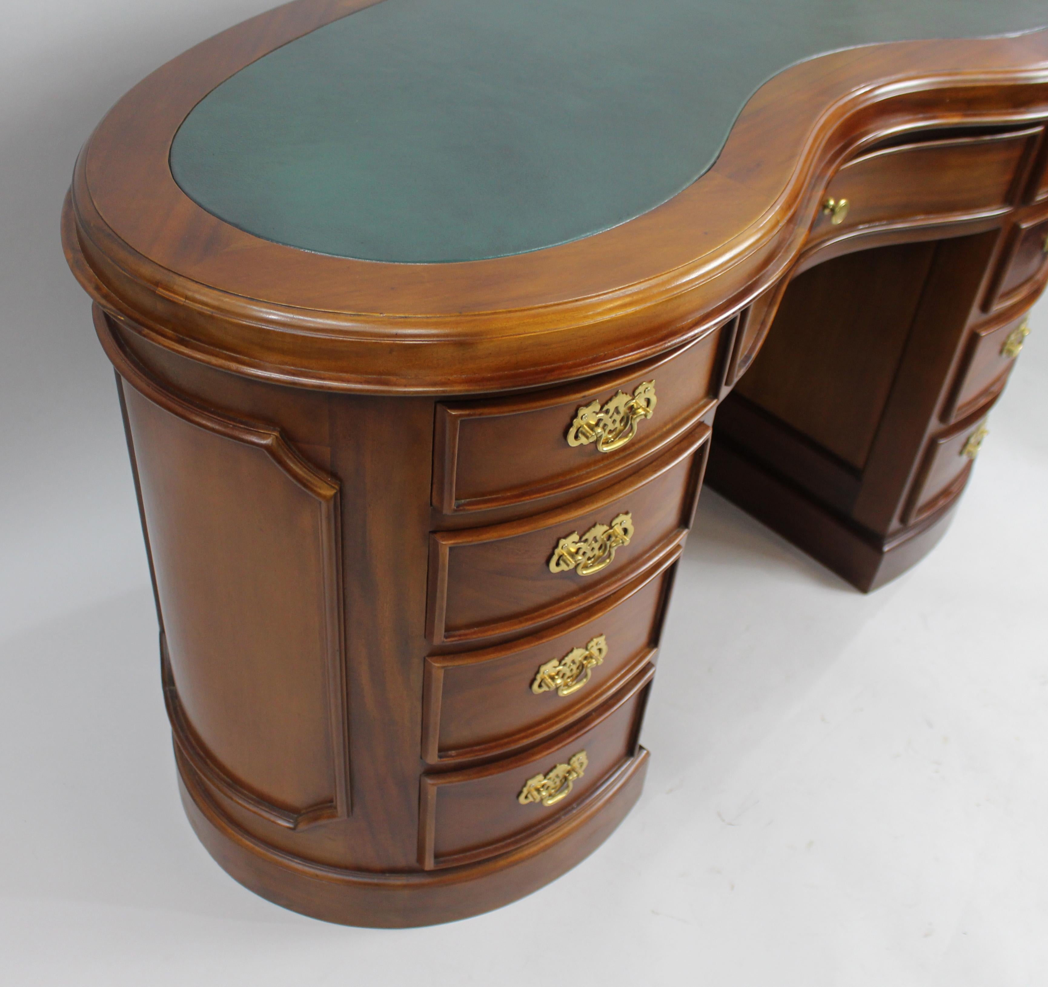 European Kidney Shaped Mahogany Leather Topped Desk For Sale