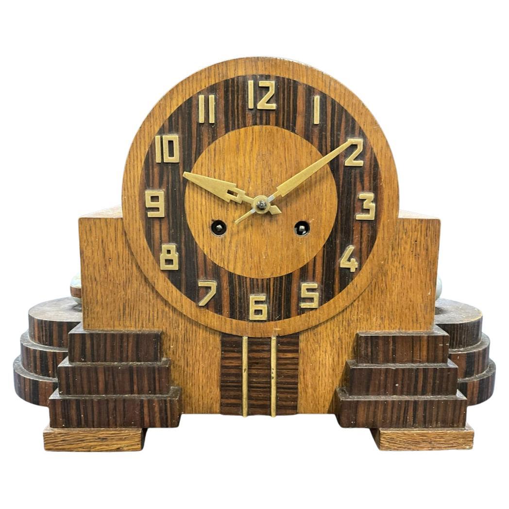 KIENZLE Reloj de manto Art Decó de ébano de Macasar y roble