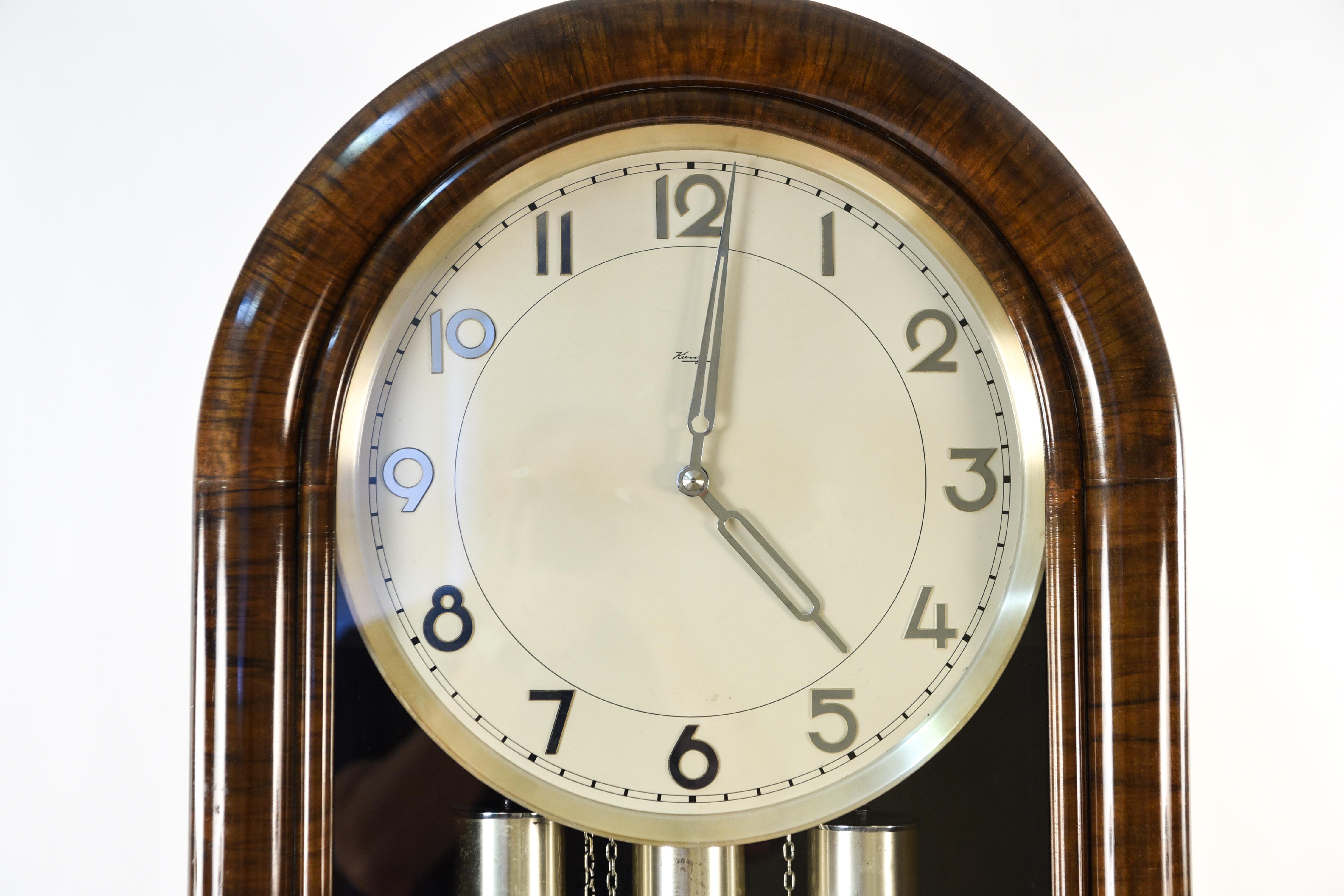 This German midcentury tall case clock, circa 1956 reads 