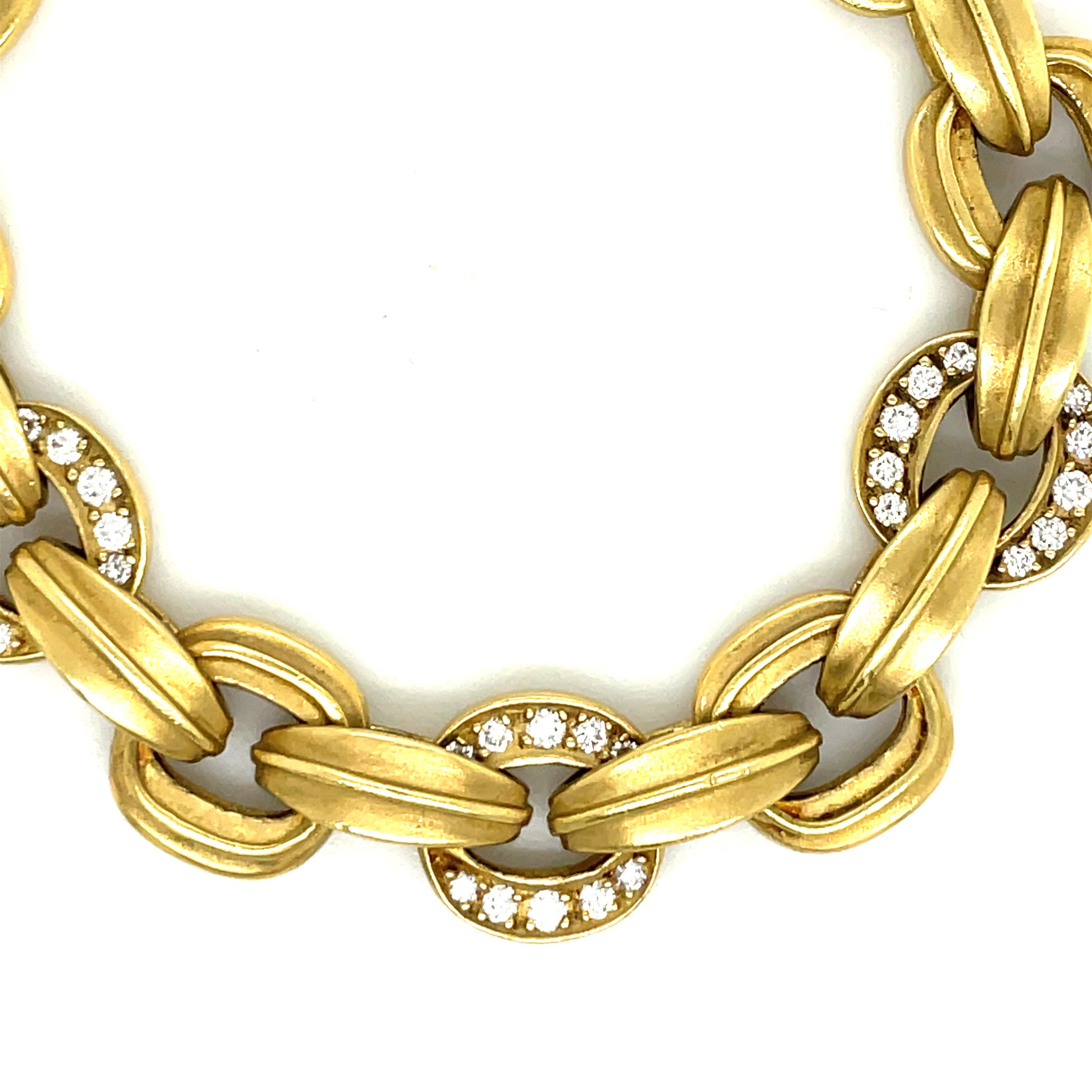 Stamped B. KIESELSTEIN-CORD 18K 2001, this bracelet features sold gold links & 3 diamond links weighing approximately 0.36 carats, 62.2 Grams. 