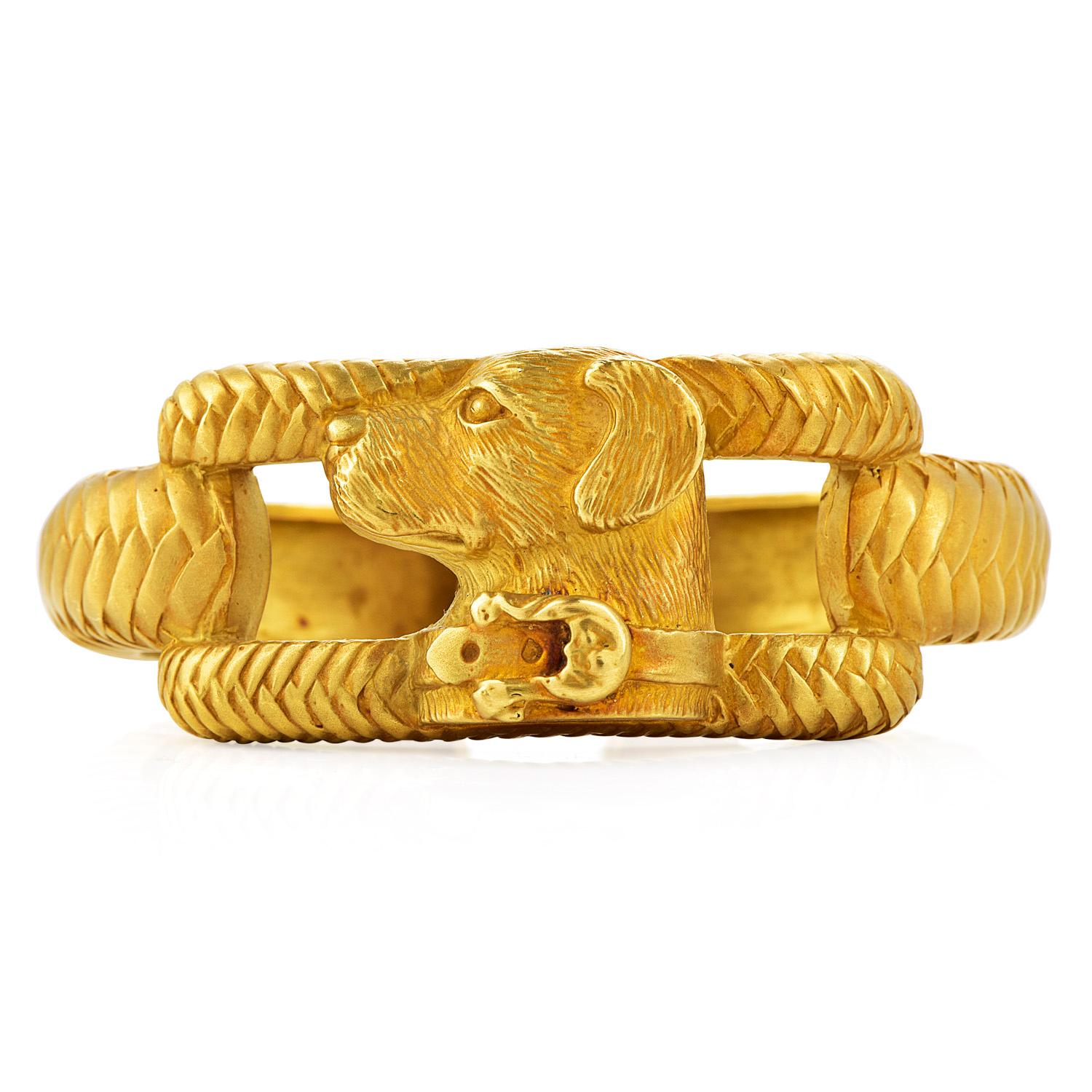 Rare Collectable Kieselstein Cord 18K Gold Labrador Retriever Dog Hinged Cuff Bangle Bracelet

Circa 1980's collection from Barry Kieselstein Cord

This beautiful Cuff bracelet featuring a carefully carved dog center piece and an engraved design