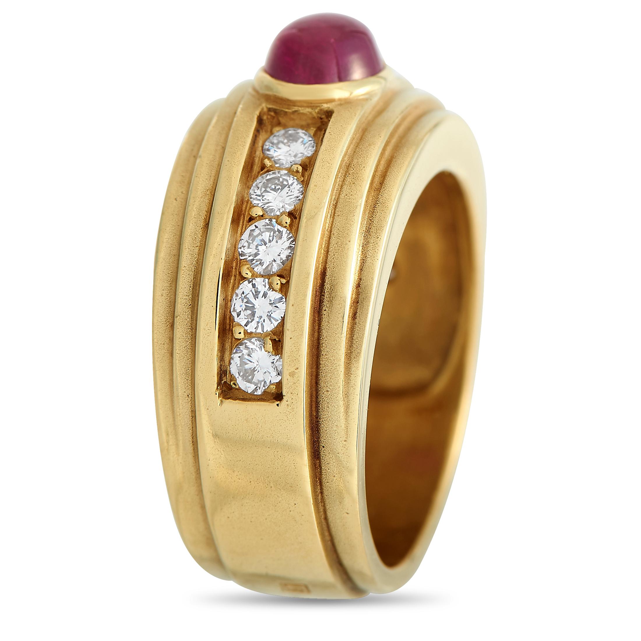 Of classical design, this Kieselstein-Cord yellow gold ring impresses with its timeless beauty and meticulous craftsmanship. The wide-band ring features fluted edges complemented by the brilliance of round diamonds which are prong-set on a deep