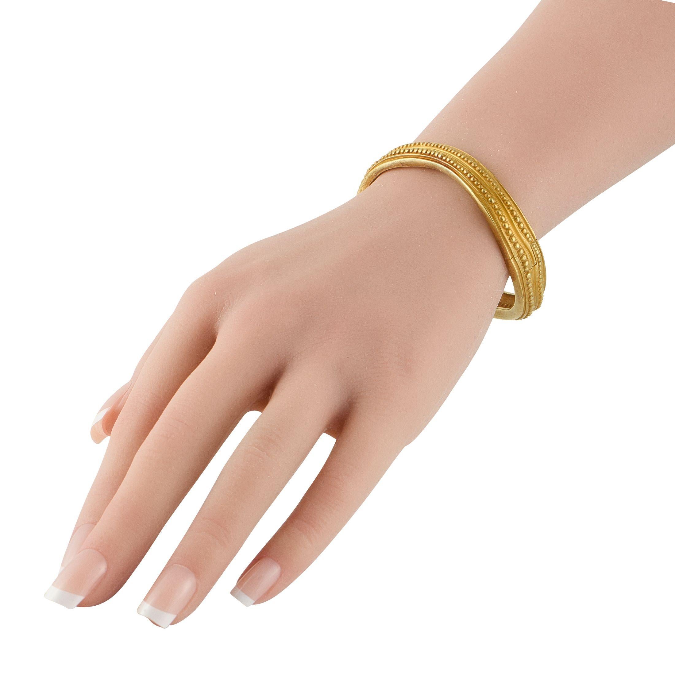 This Kieselstein-Cord bracelet is poised to put the perfect finishing touch on any ensemble. Crafted from 18K Yellow Gold, the understated design is elevated by intricate beadwork and a gently curved setting. It measures 7.0 long.This jewelry piece