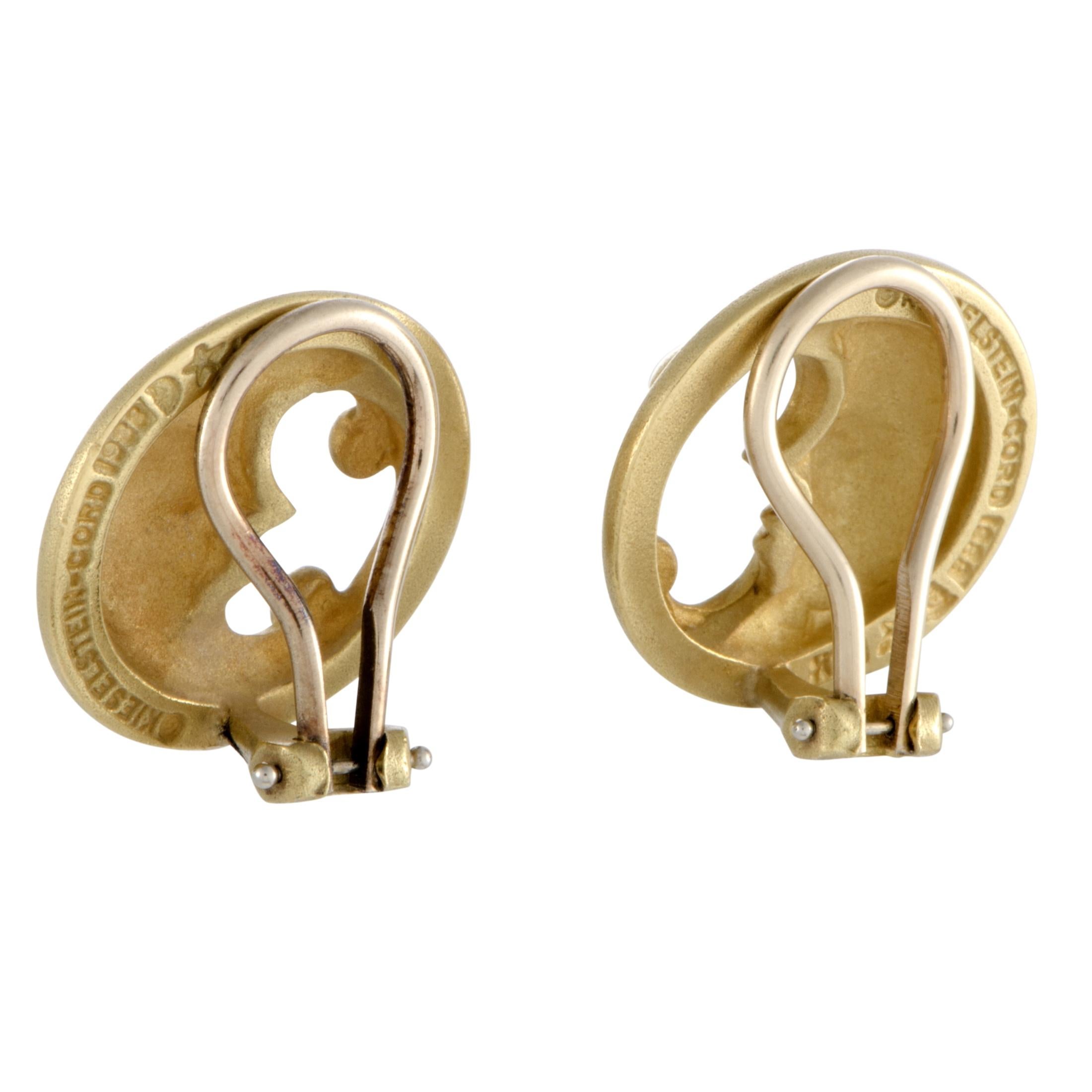 Depicting celestial crescent moons in an exceptionally artistic manner, these extraordinary earrings designed by Kieselstein-Cord offer an intriguingly fashionable look. The pair is beautifully crafted from radiant 18K yellow gold, with each of the