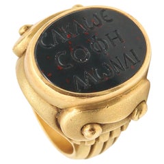 KIESELSTEIN CORD 1984 Anillo calcográfico de oro amarillo de 18 quilates con piedra de sangre